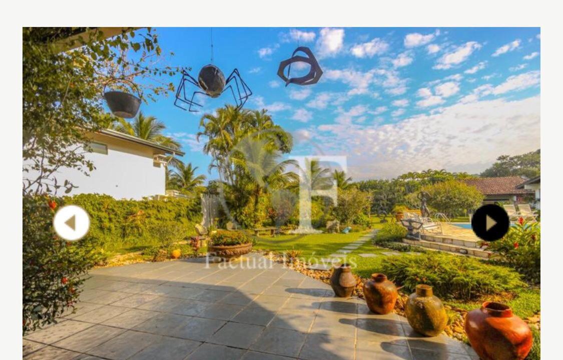 Deslumbrante casa condomínio fechado praia de Pernambuco - Guarujá