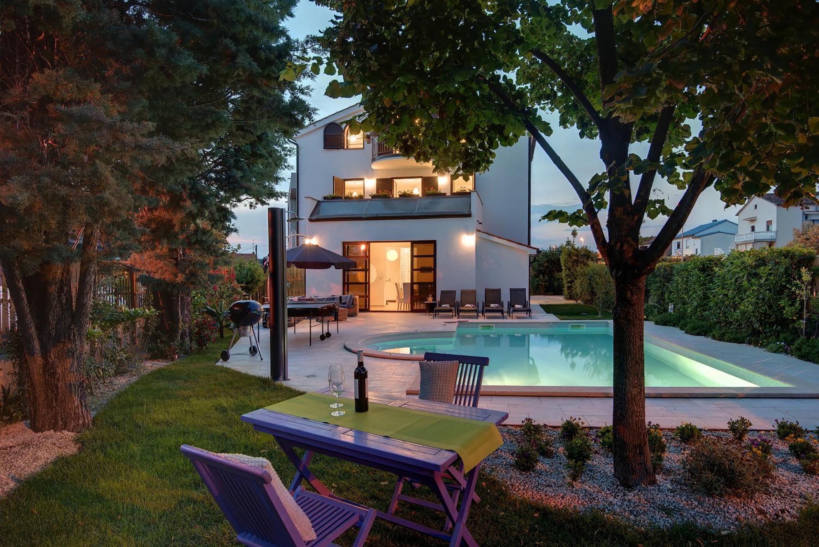 Villa Andrija Family Dream with heated pool at the sea with beautiful garden, outside cinema and kids playground
