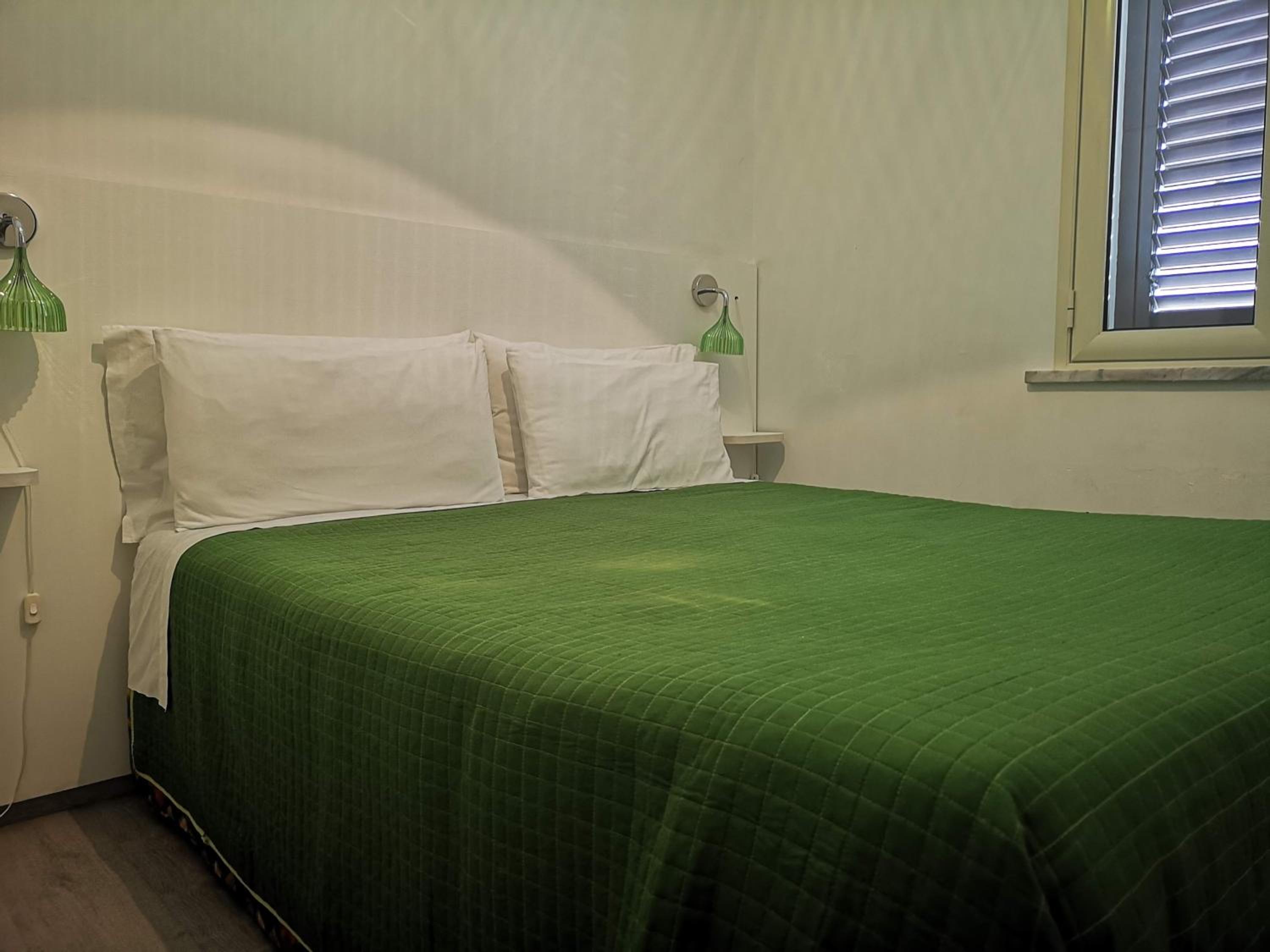 SunMoon en Reggio Calabria — bedroom