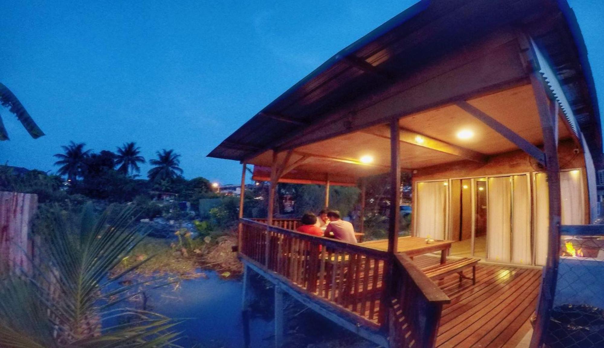 Tung's Tropika - With a Wooden Hut by a Lake photo 1