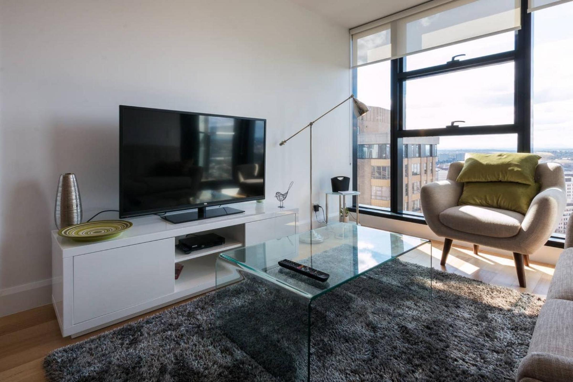 Owen · Soaring City Views Central Location