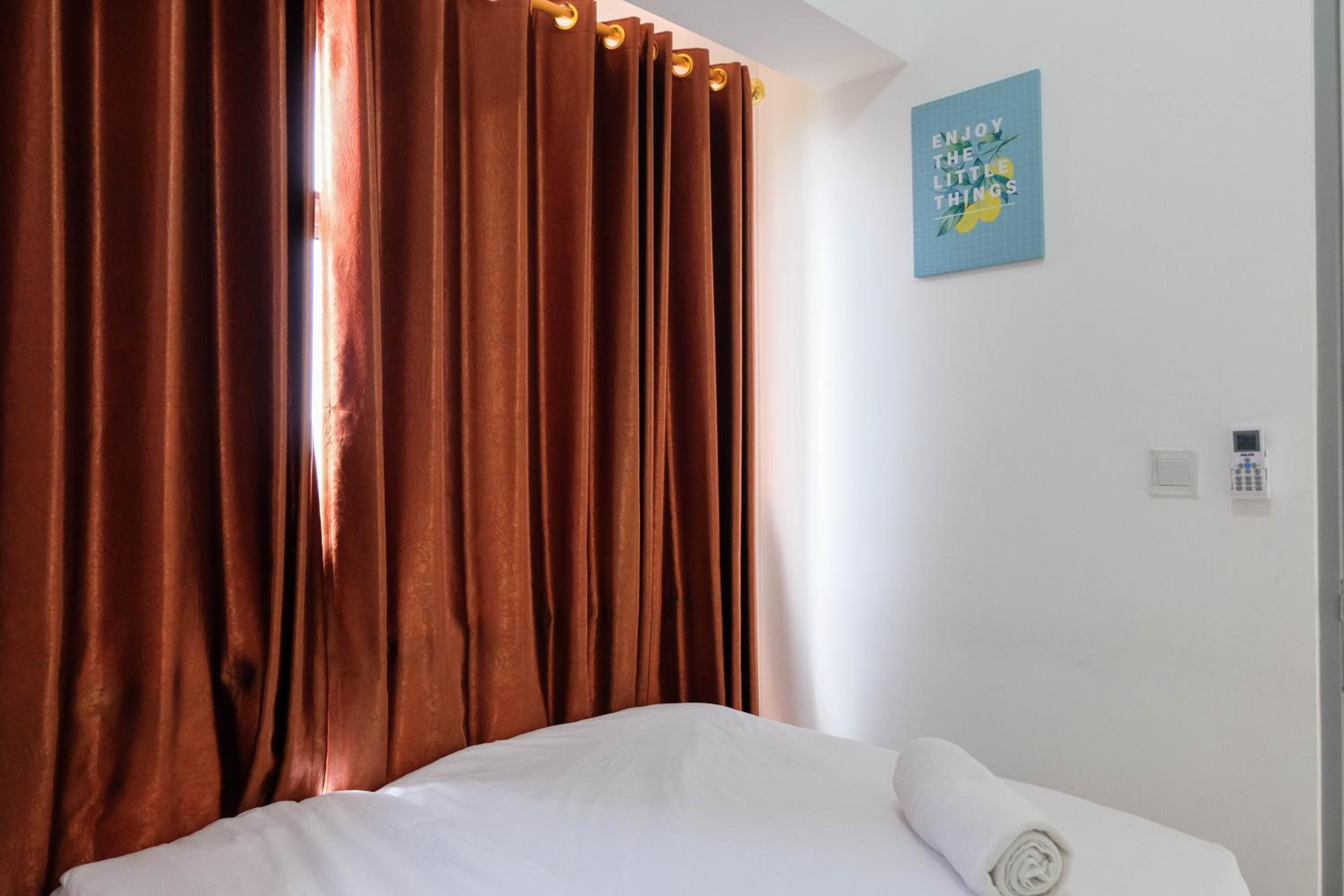Comfortable 2BR Apartment at M-Town Residence By Travelio