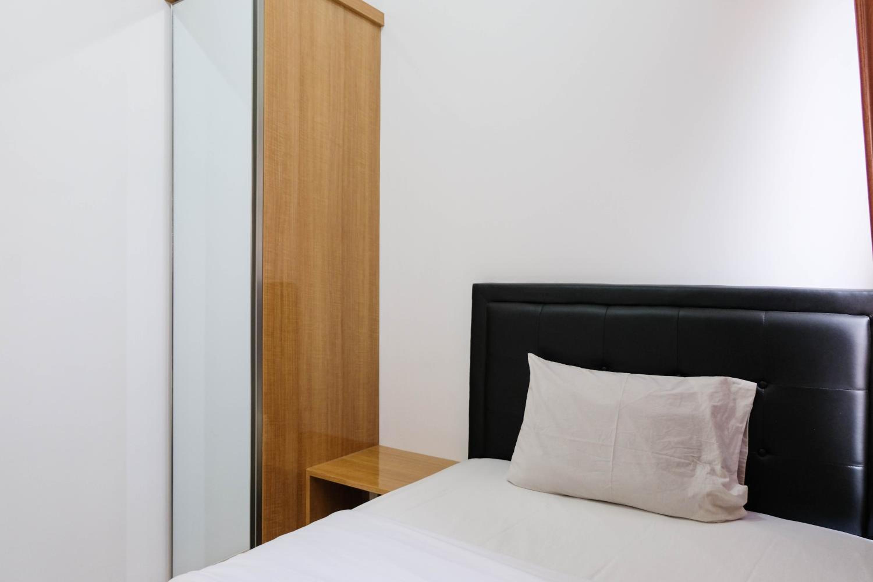 Comfortable 2BR Apartment at M-Town Residence By Travelio