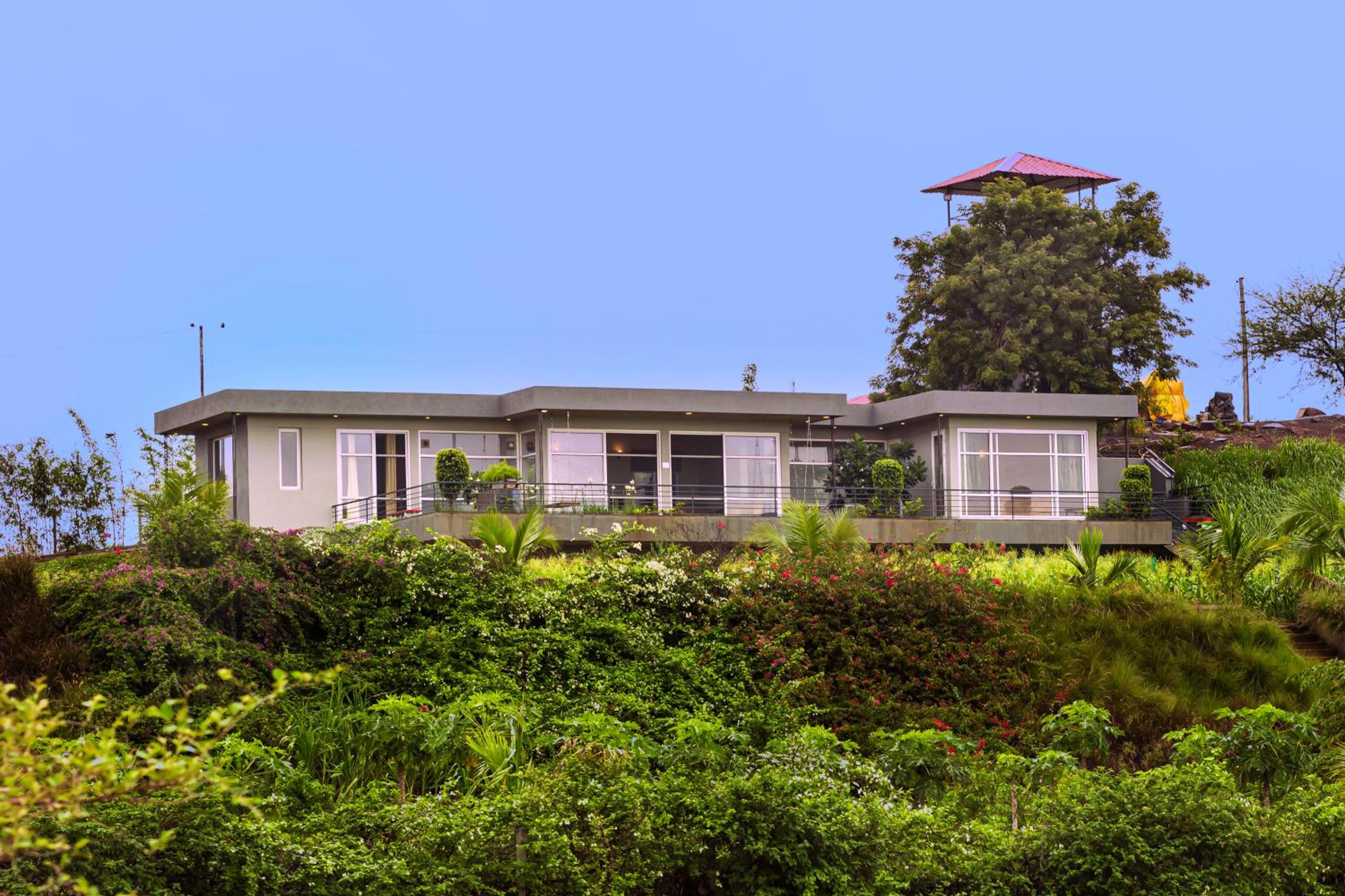 SaffronStays Serenity - 2BR villa overlooking Lake Kadwa with garden, swings & treks near Sula Vineyard view 5