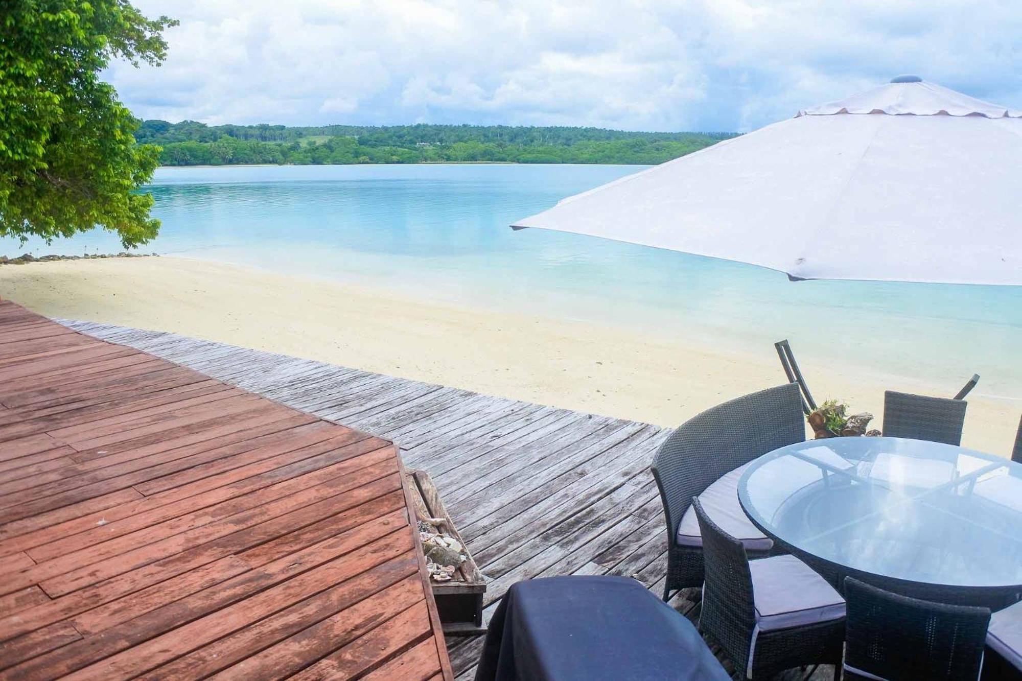 Santo Sunset Beach Villas on Surunda Bay view 2