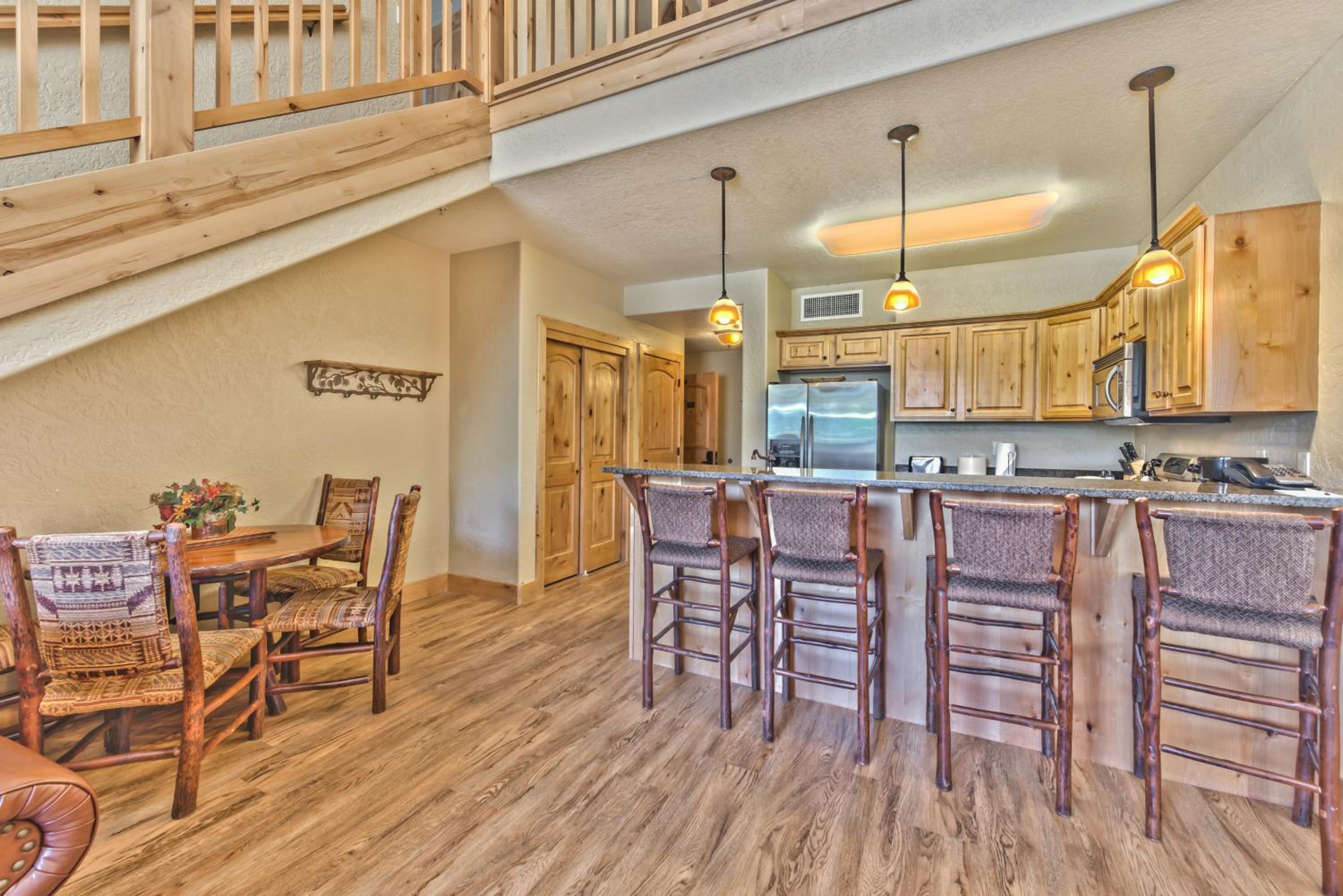 Steps to skiing, resort property, mountain views, shared hot tub, sauna, steam room 223