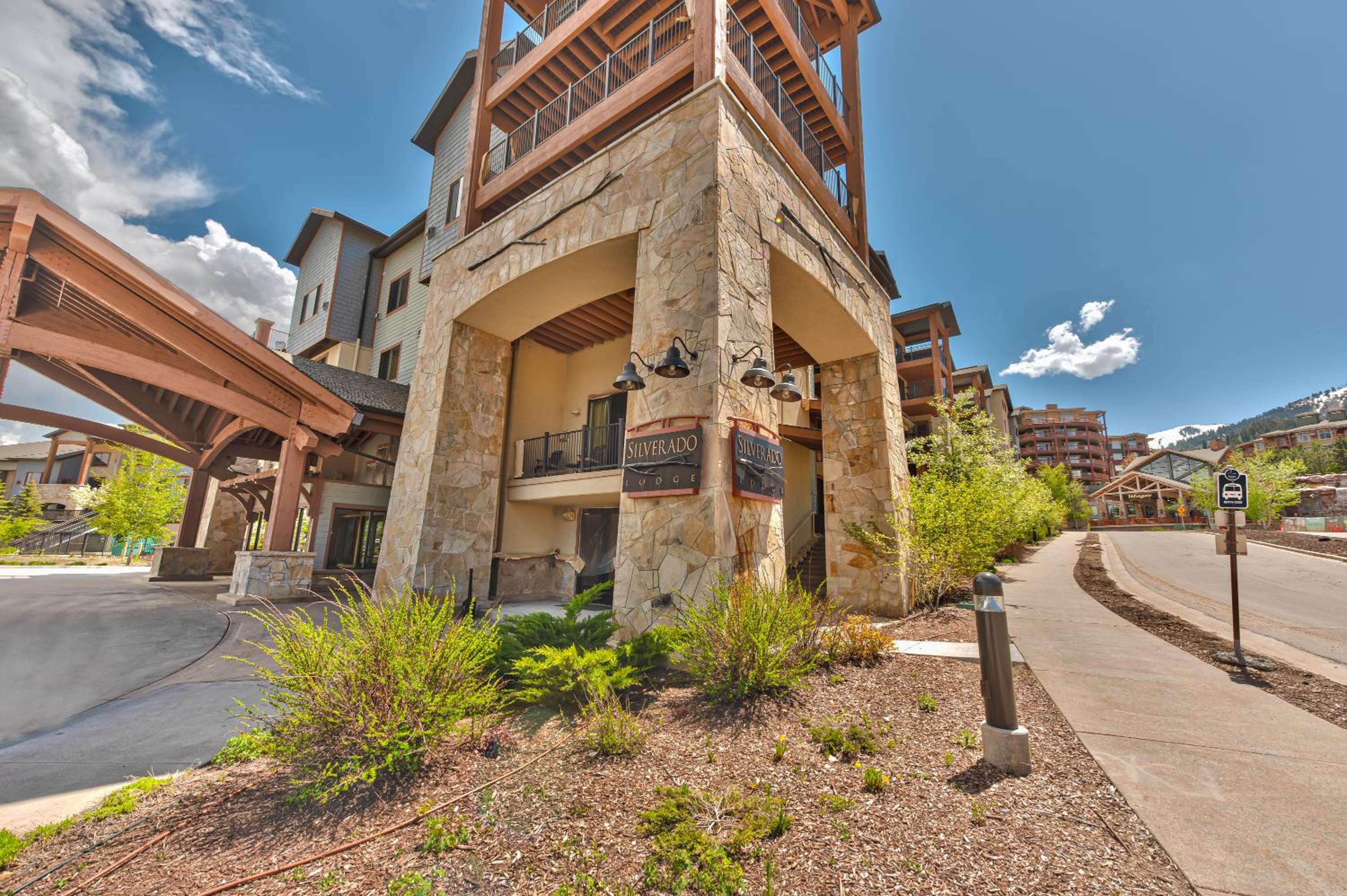 Steps to skiing, hotel room, mountain views, shared hot tub, sauna, steam room, fitness room 223A