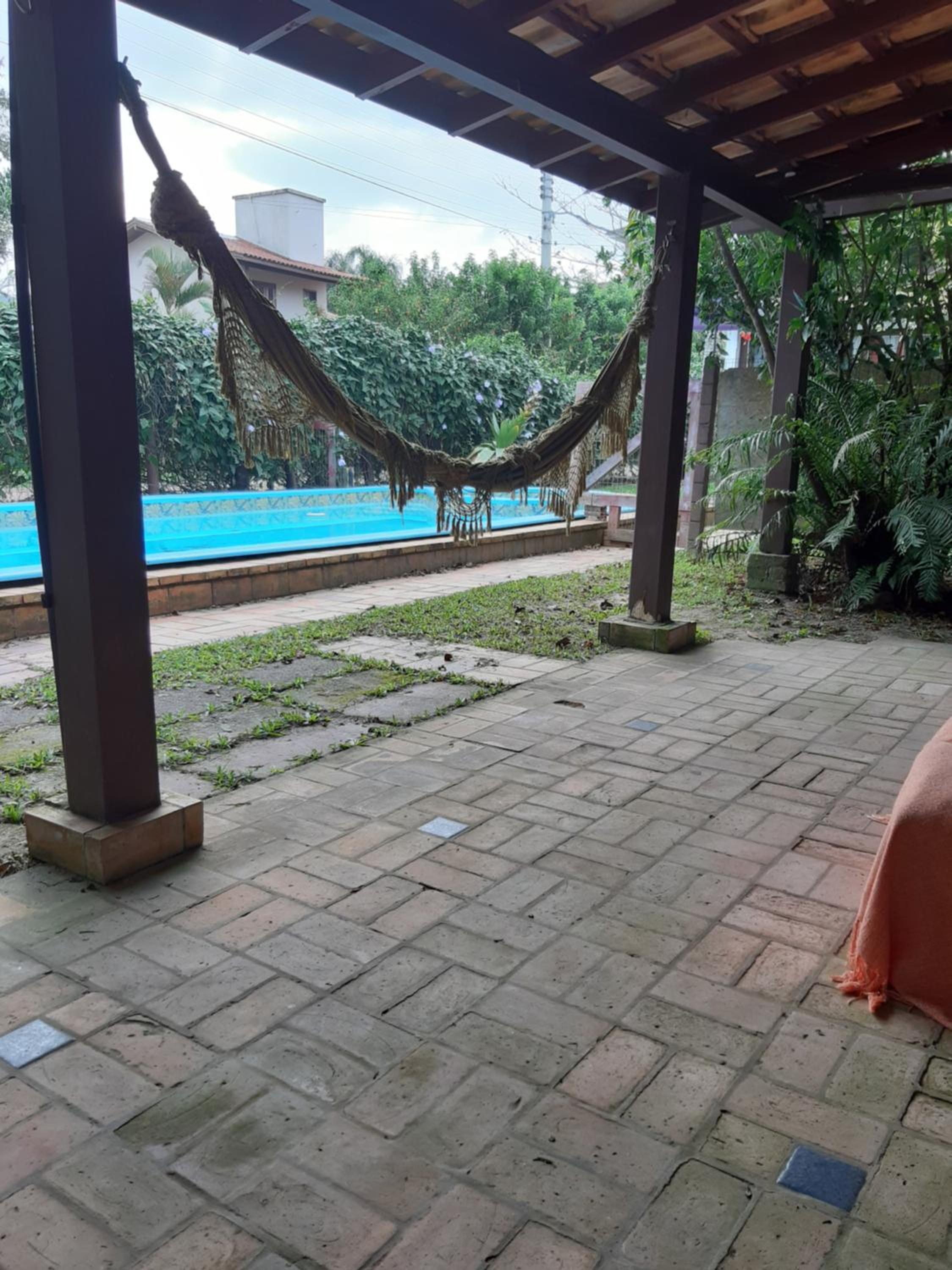 Casa Rústica praia da Ferrugem próximo praia com piscina compartilhada
