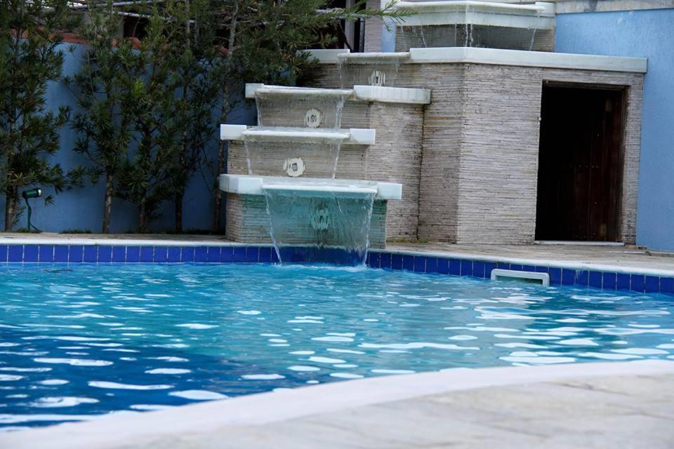 Chalés individuais com piscina a 500M da praia view 5
