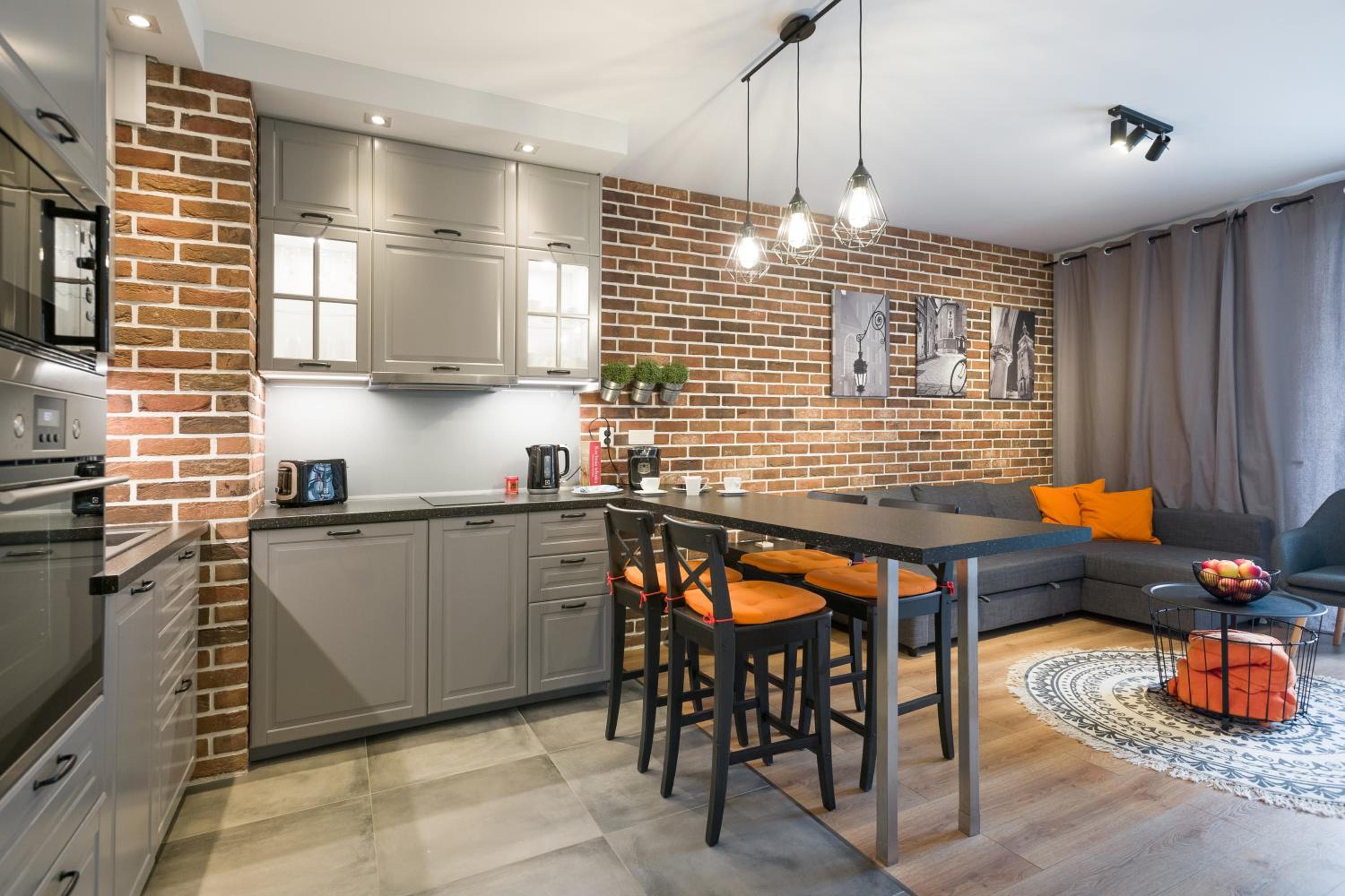 Orange, modern apartment in the city centre view 2