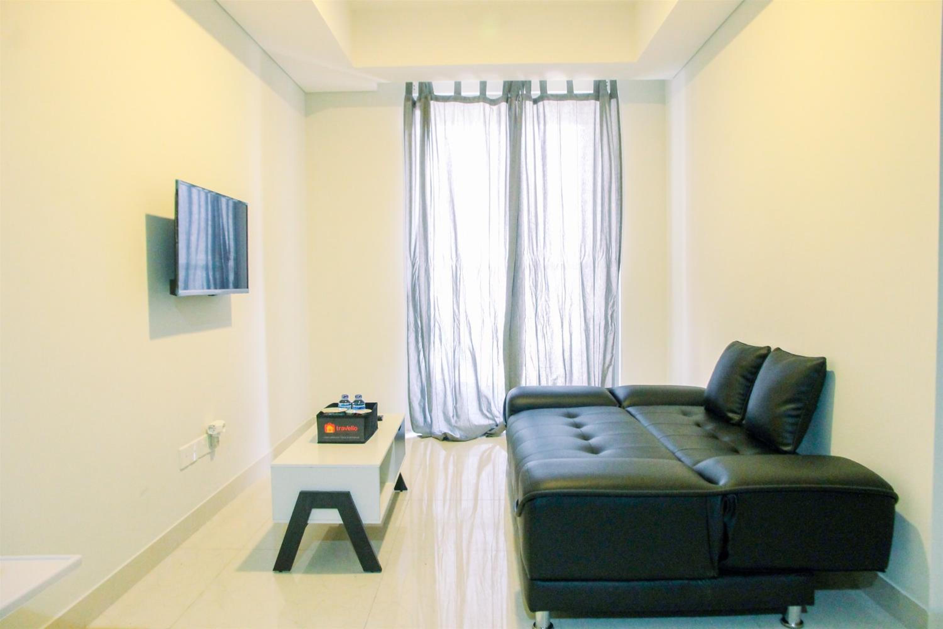 Wonderful 2BR at Gold Coast Apartment Pantai Indah Kapuk By Travelio view 2