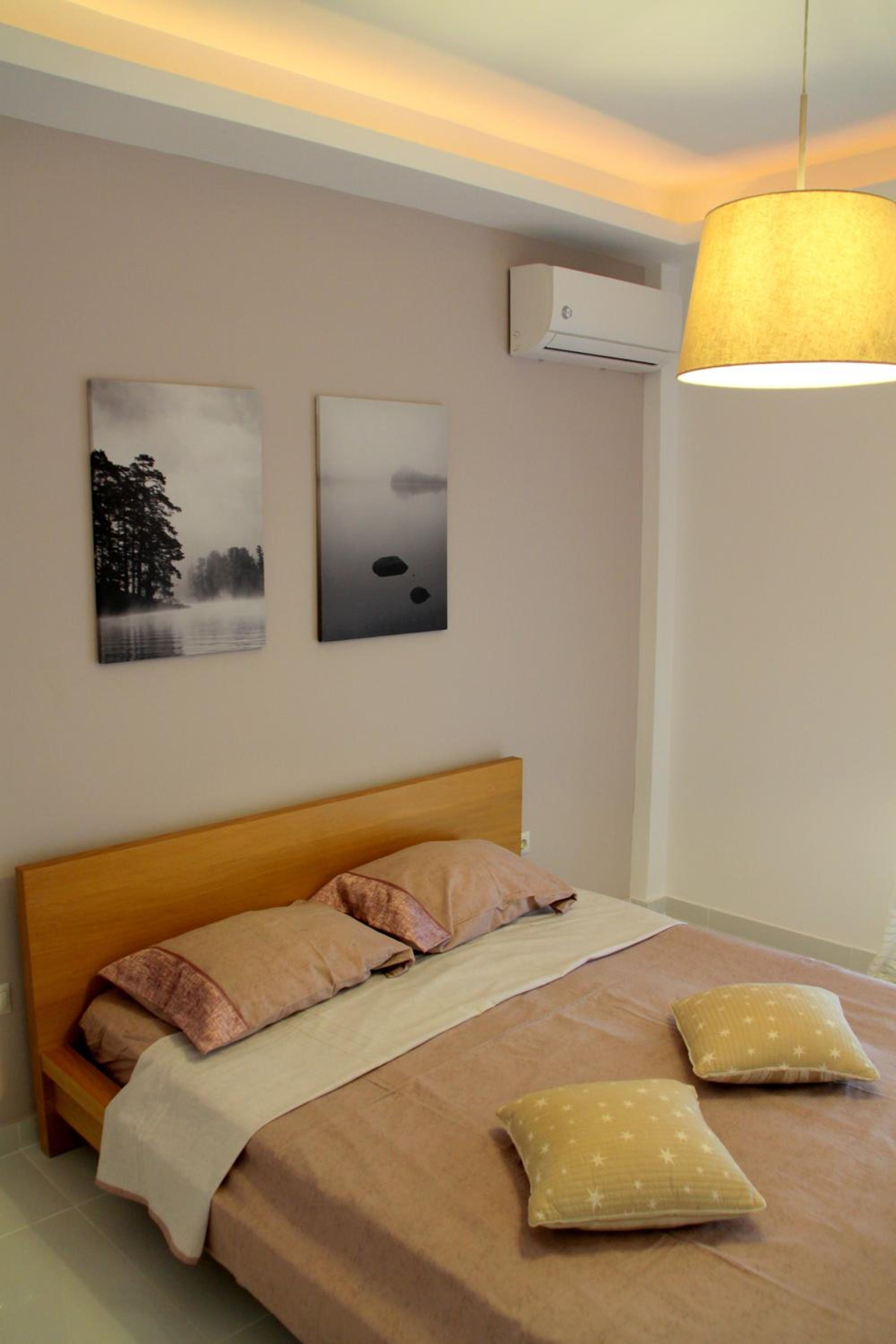 Thiseos 319. Beautiful apartments near the cultural center of the capital.