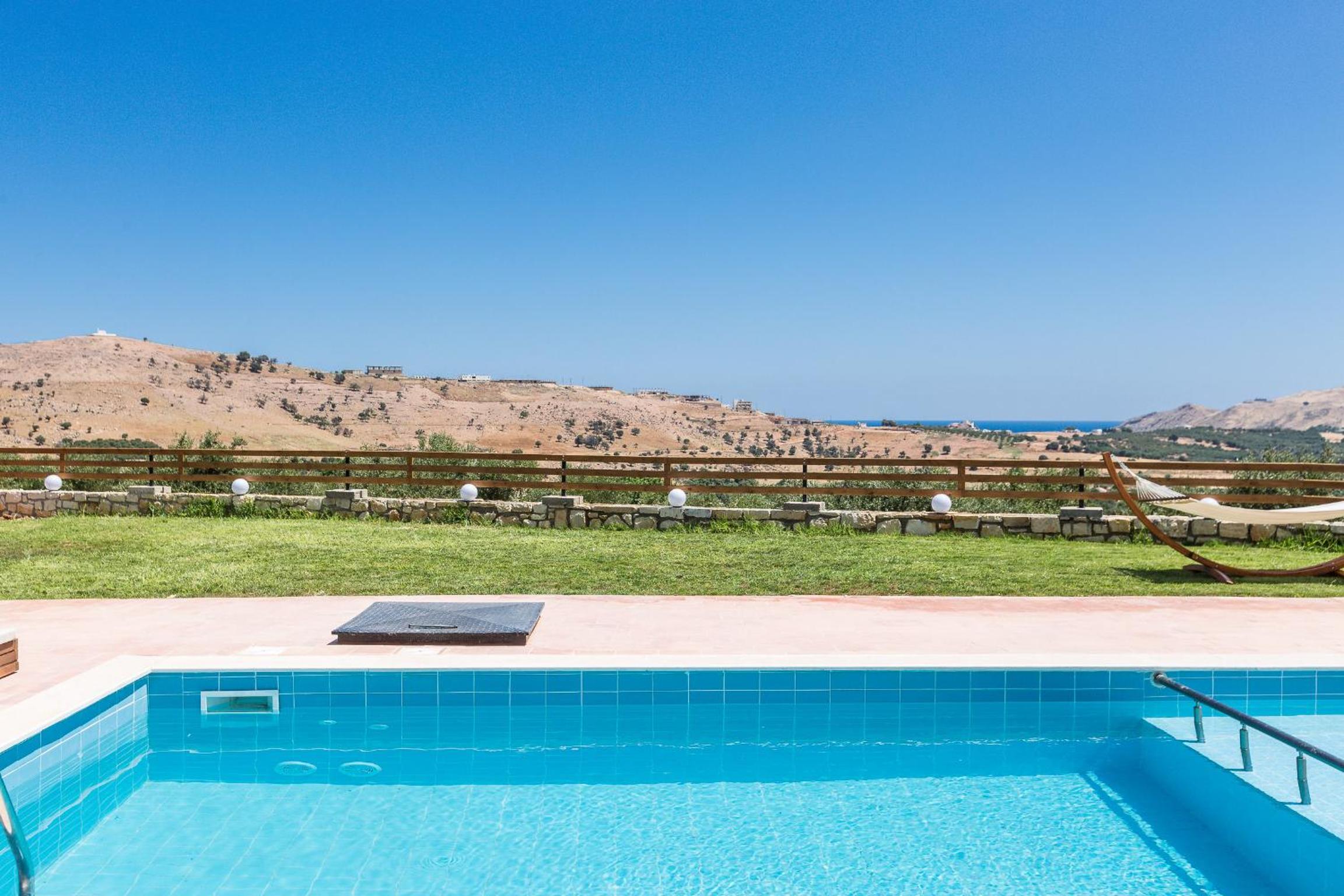 Dimokritos Villas IV, V, & VI, a homestay experience, By ThinkVilla view 3