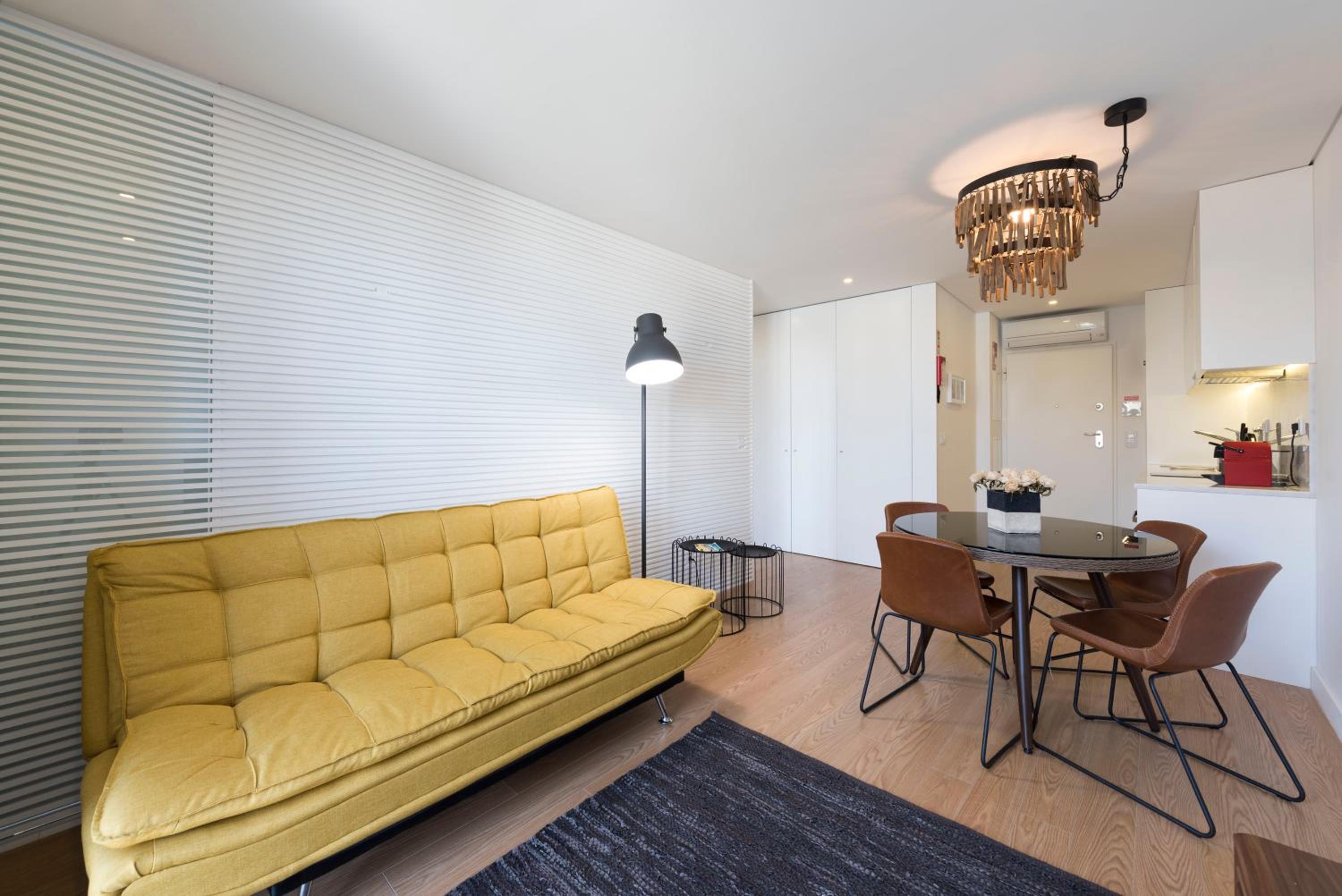LovelyStay - Central Flat w/ AC & Balcony view 2