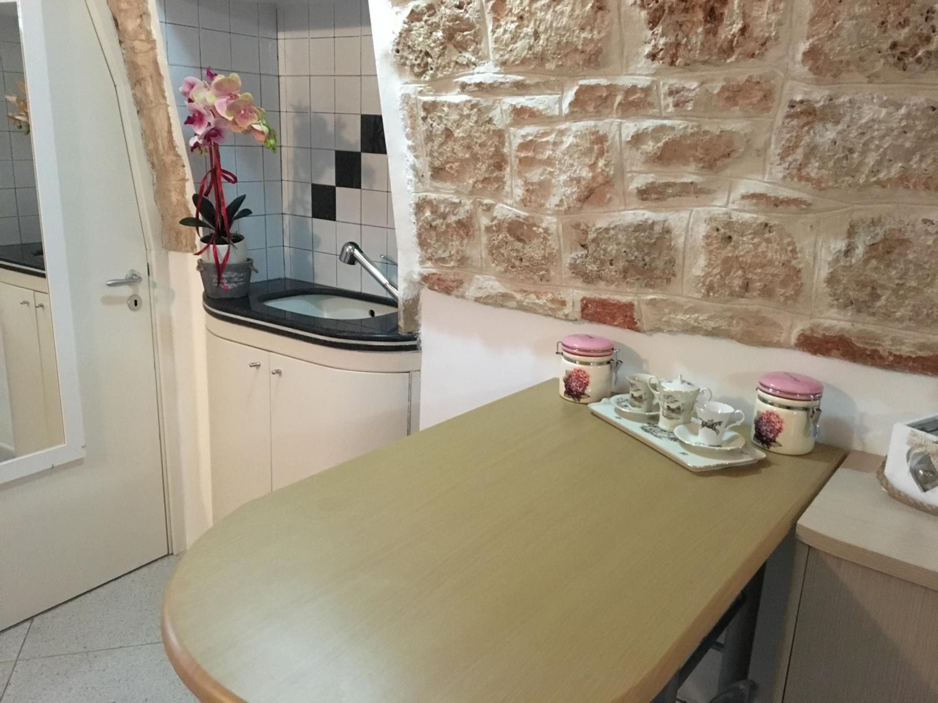 Casa le Arcate en Noci — kitchen