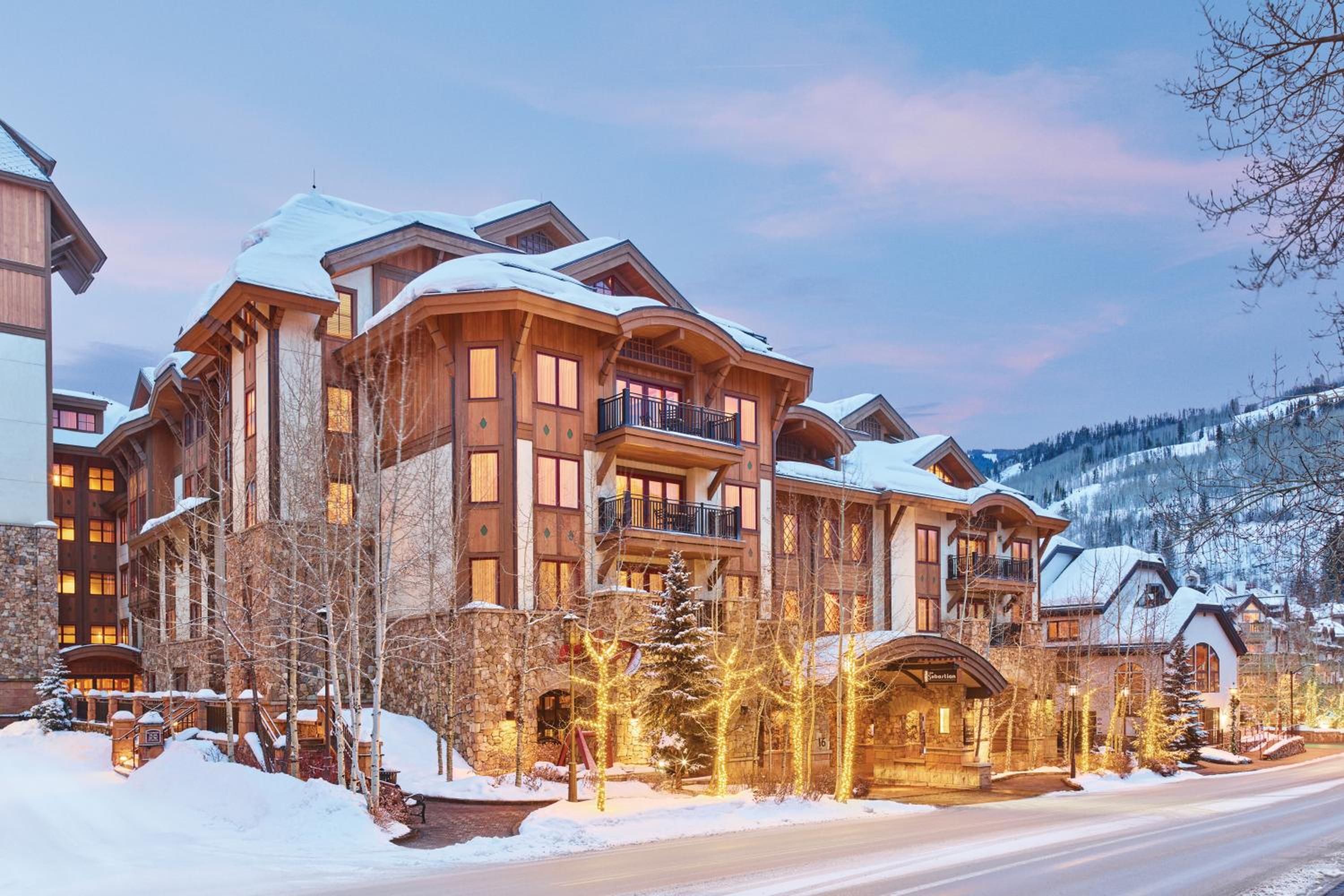 Exterior of the Sebastian Vail, five star resort in Vail, with a layer of snow in the winter