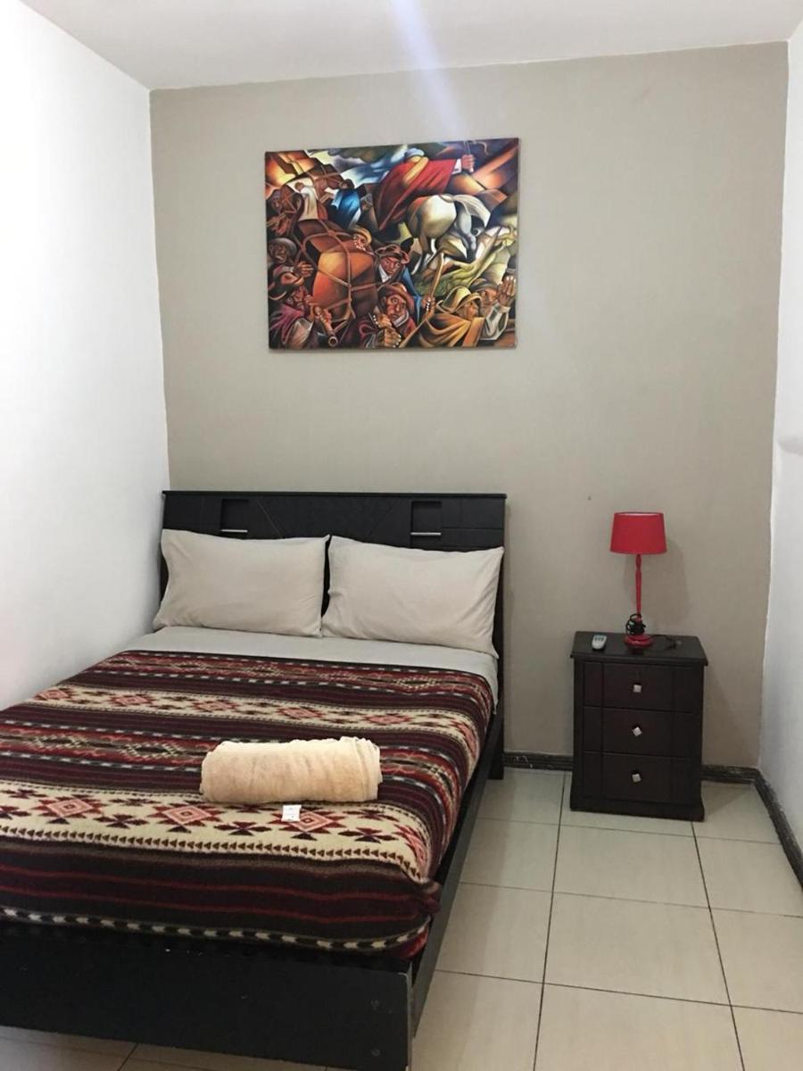 The Backpacker Hostal view 4