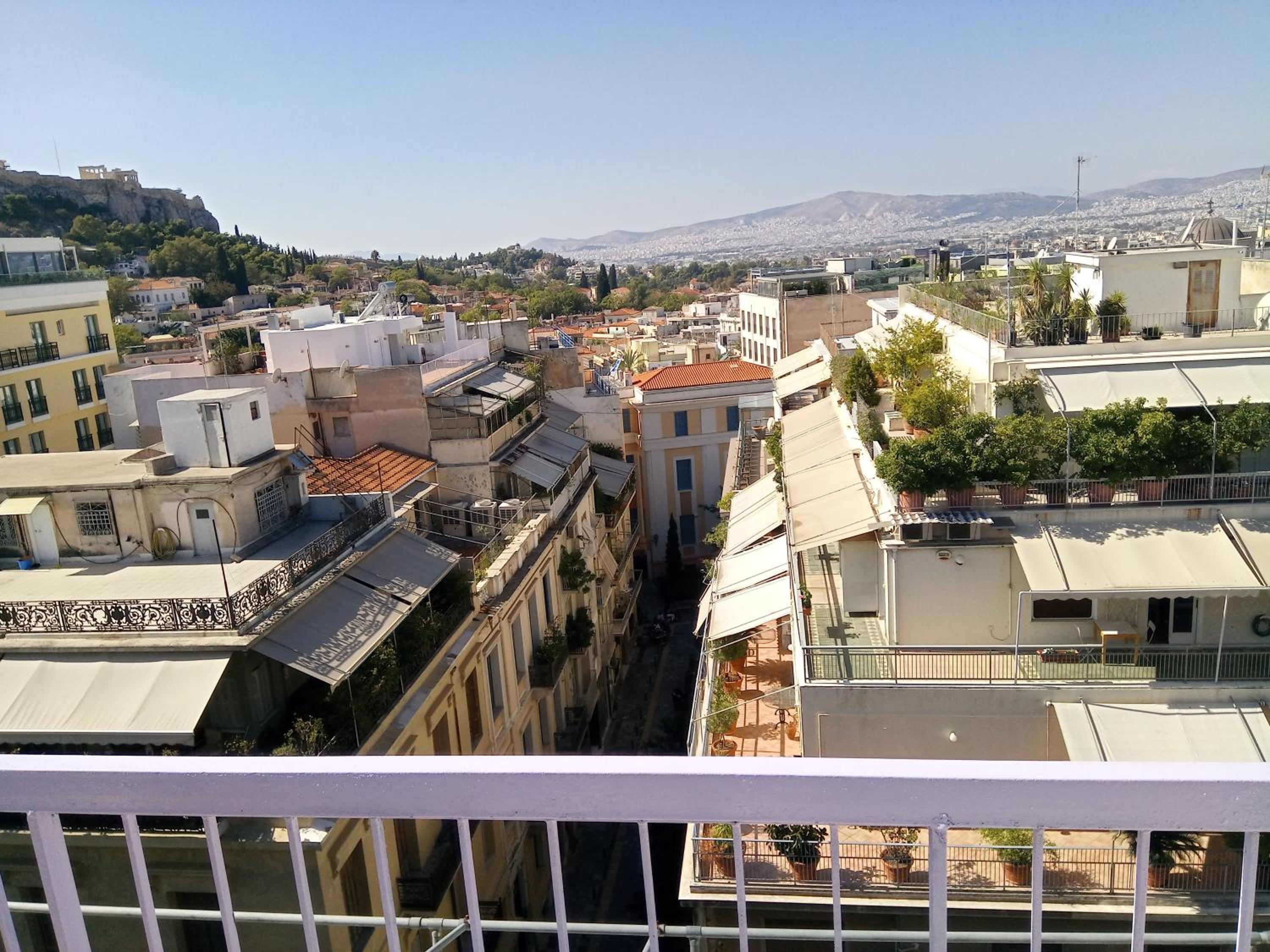 Elegant Plaka Retreat by Liberty's Canvas