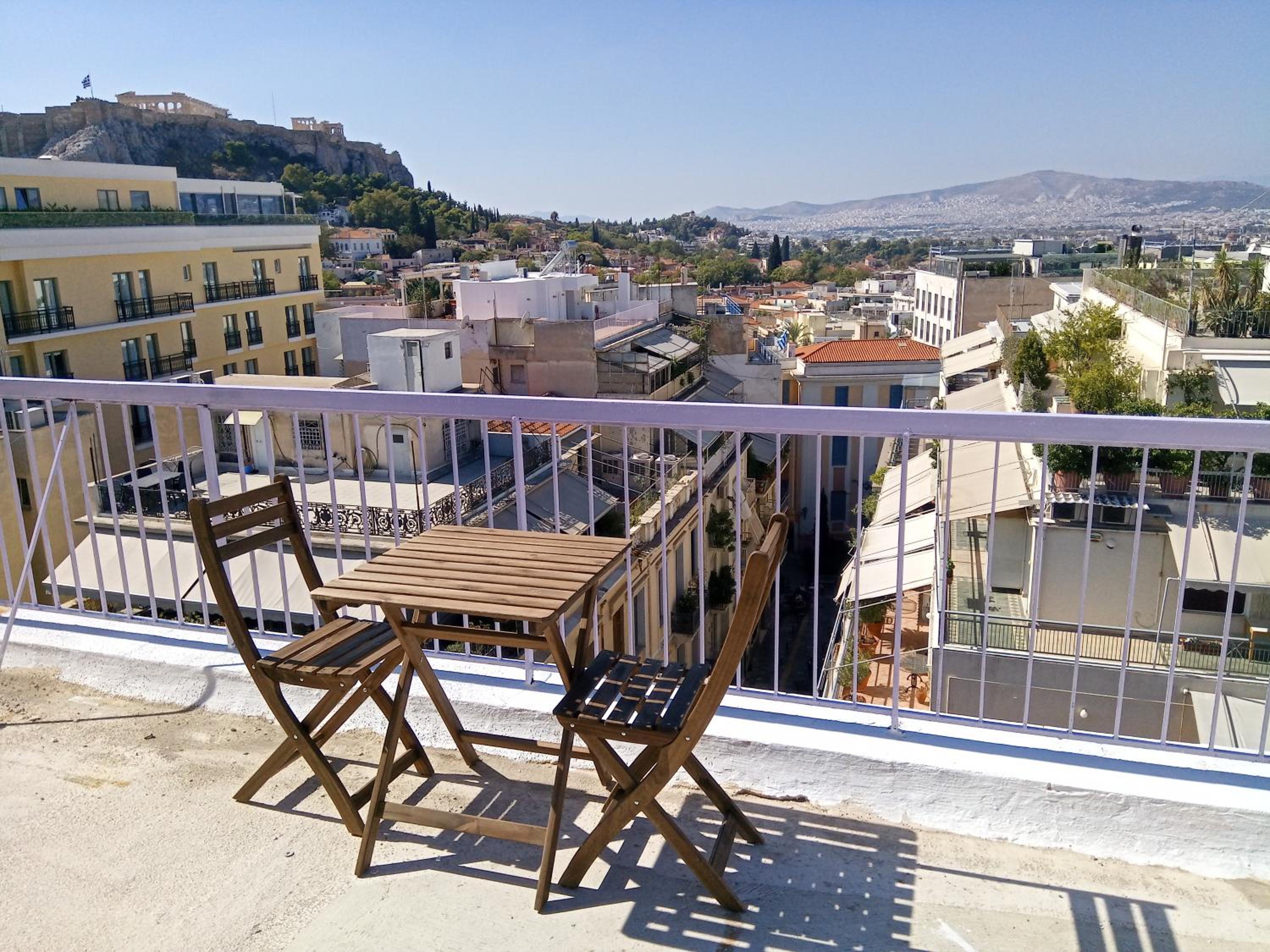 Elegant Plaka Retreat by Liberty's Canvas