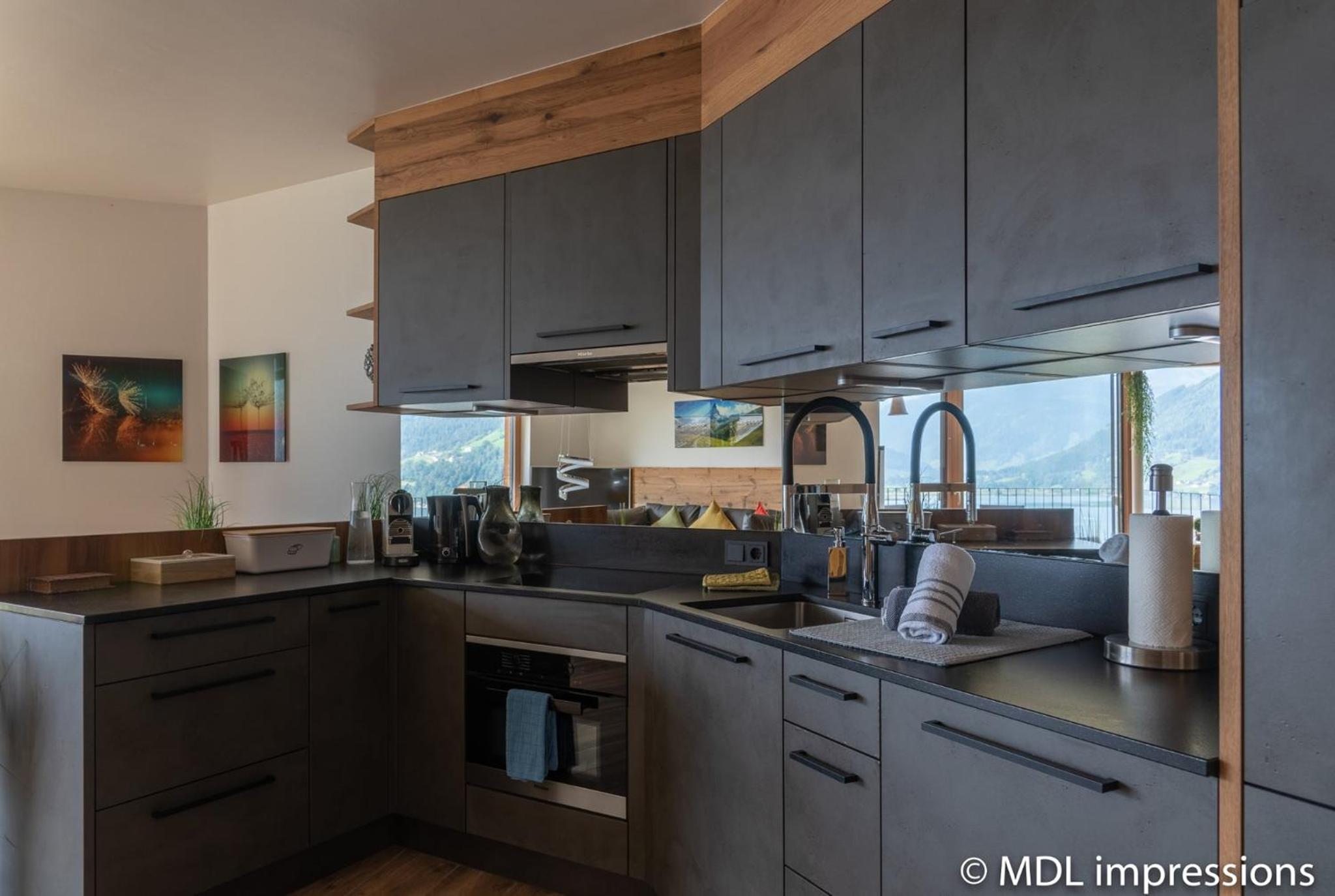 Apartments Adlerhorst Top 1 Zell am See with private sauna and Zell am See Kaprun summercard in summer view 5