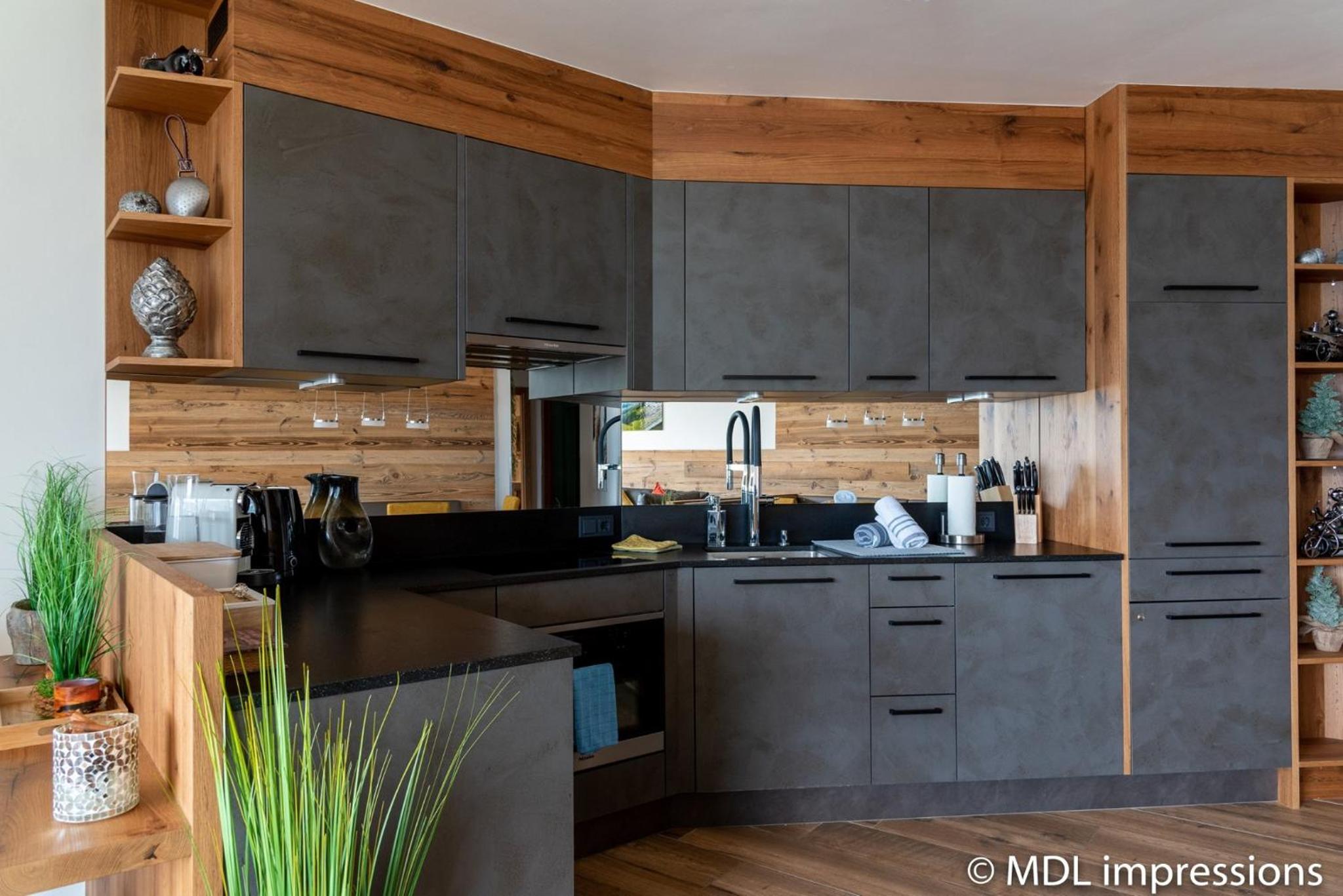 Apartments Adlerhorst Top 1 Zell am See with private sauna and Zell am See Kaprun summercard in summer view 2