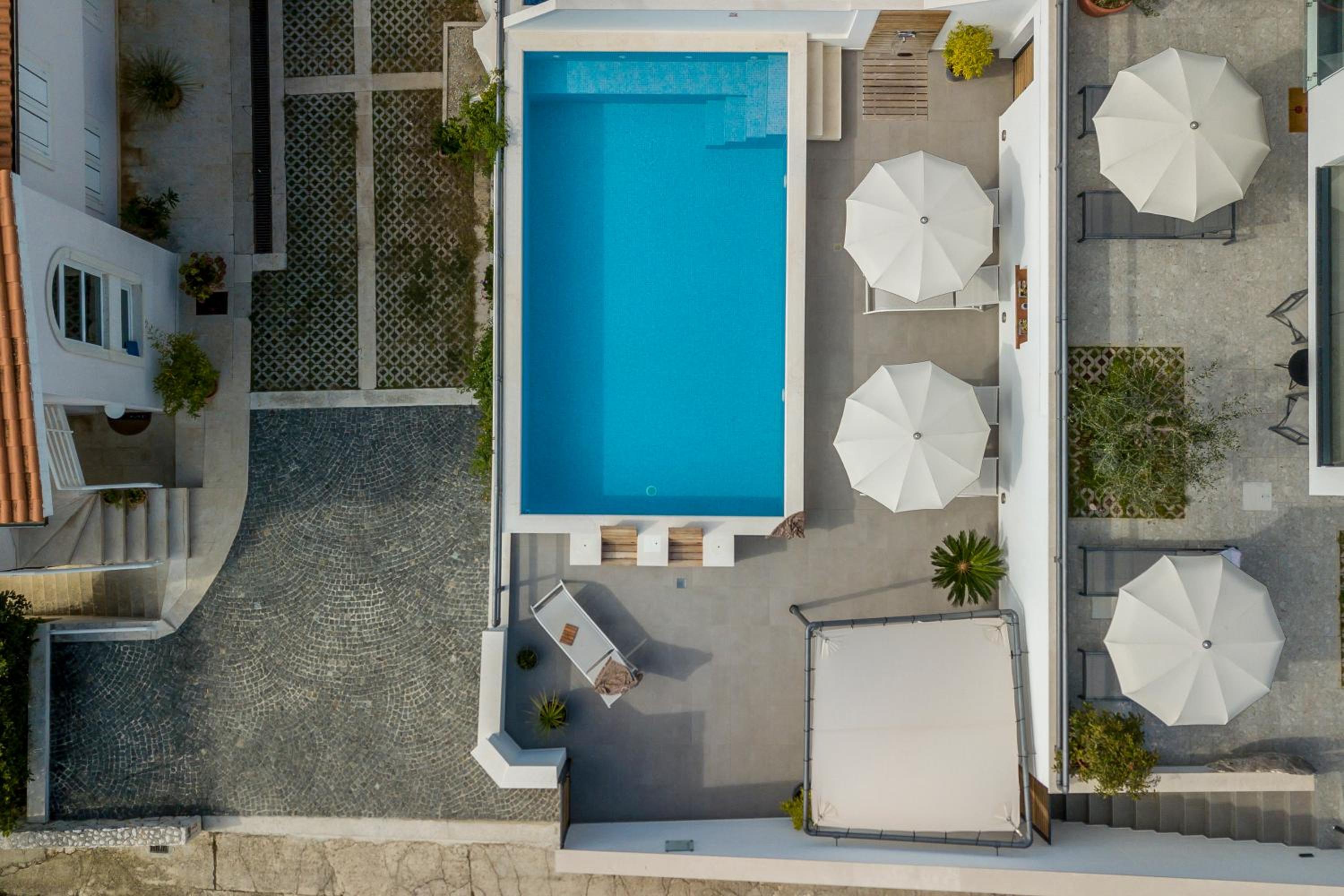 Holiday home Lola, sea on a palm! HEATED POOL view 5