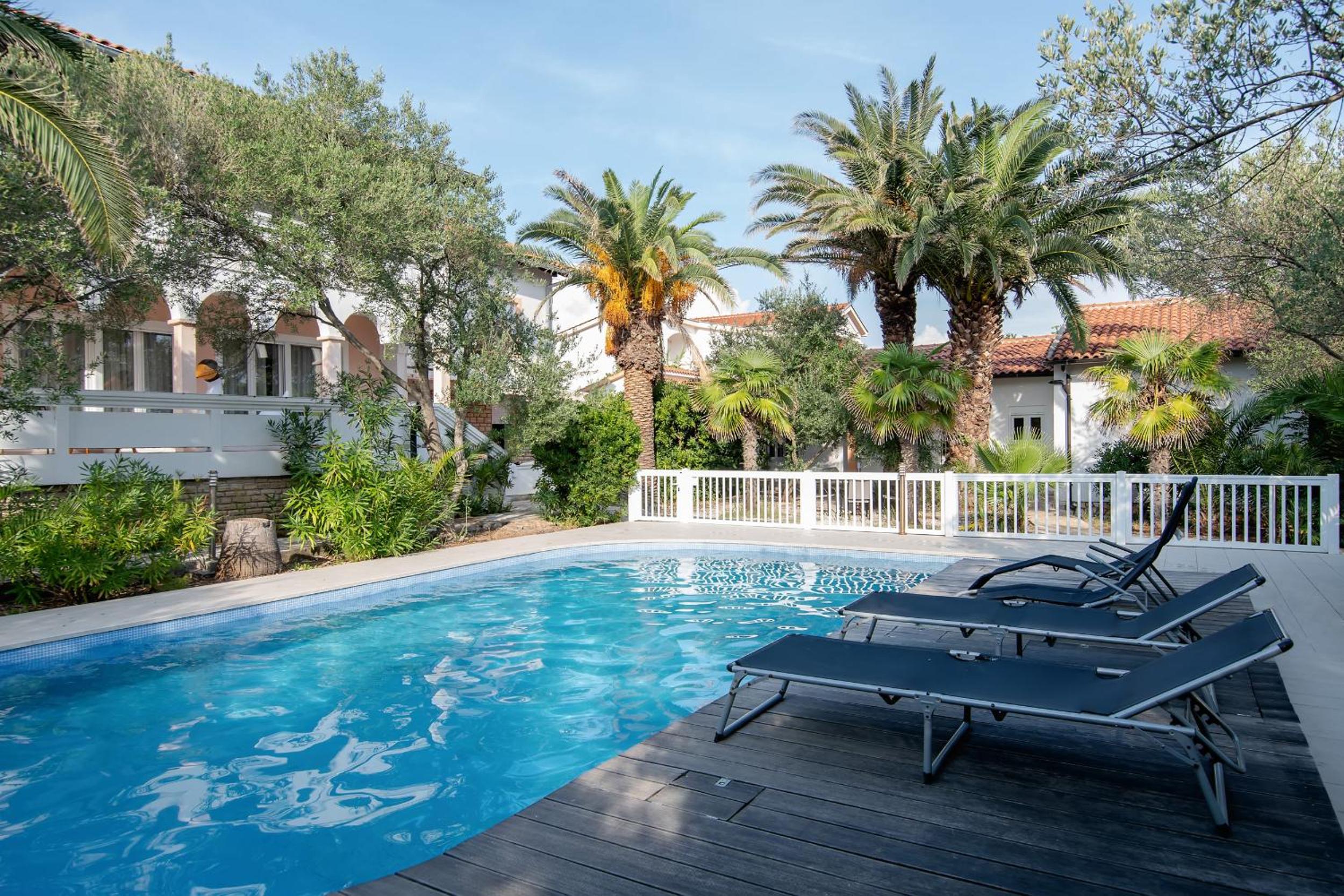 Beach Boy & Pool Girl Apartments
