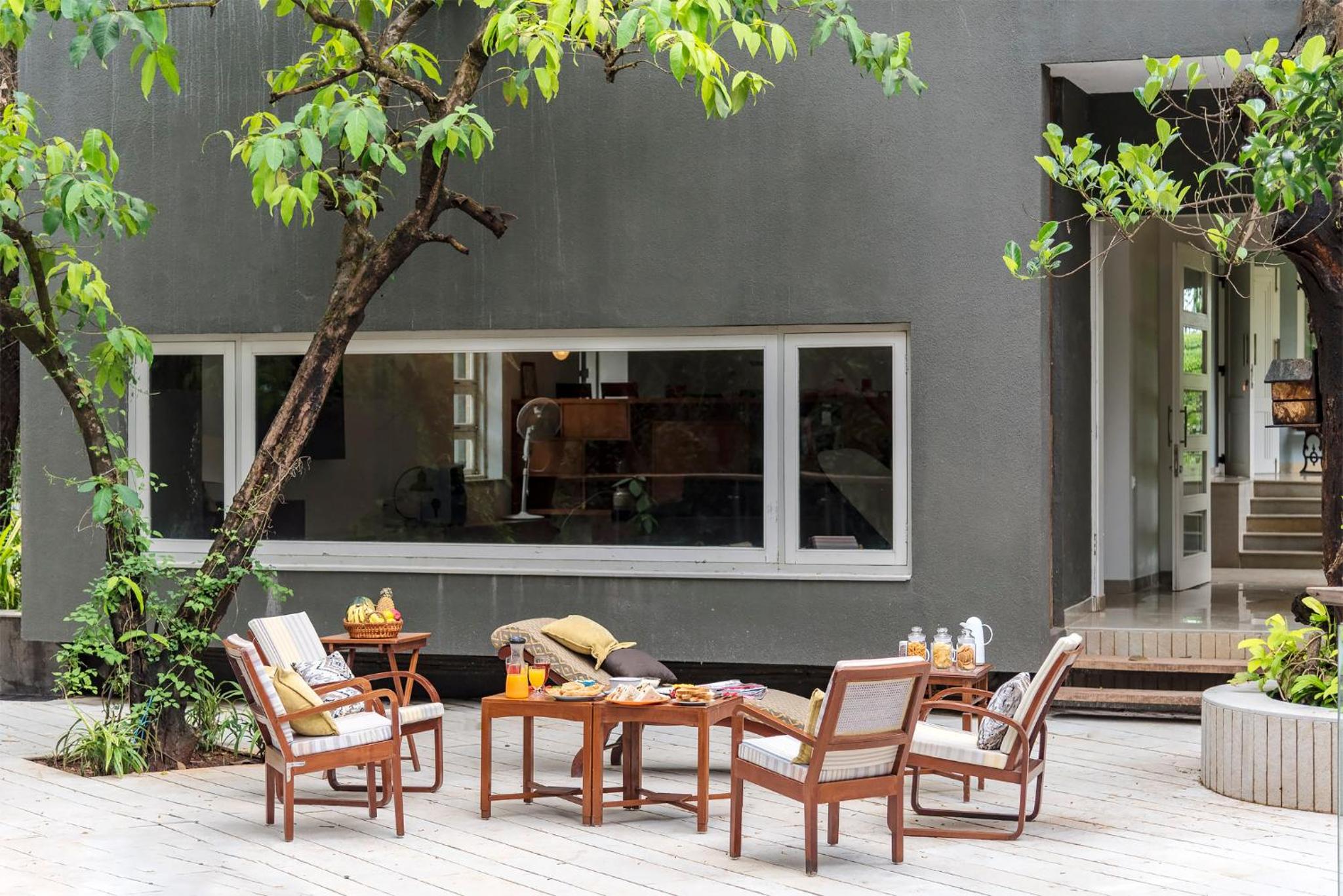 SaffronStays Odeon - 4BR heritage art deco villa with cantilever pool, verandahs & forested lawns view 4