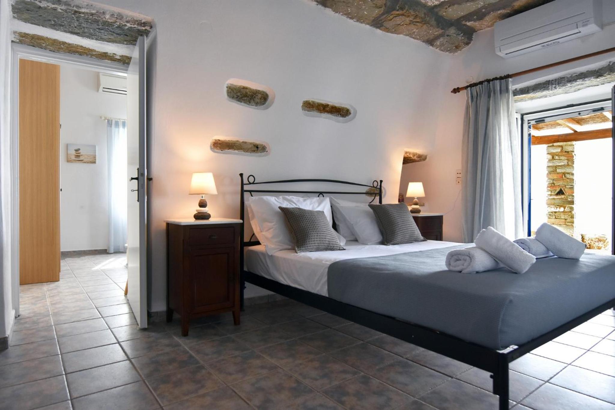 The Stone Beach House in the area of Kampi, Koundouros