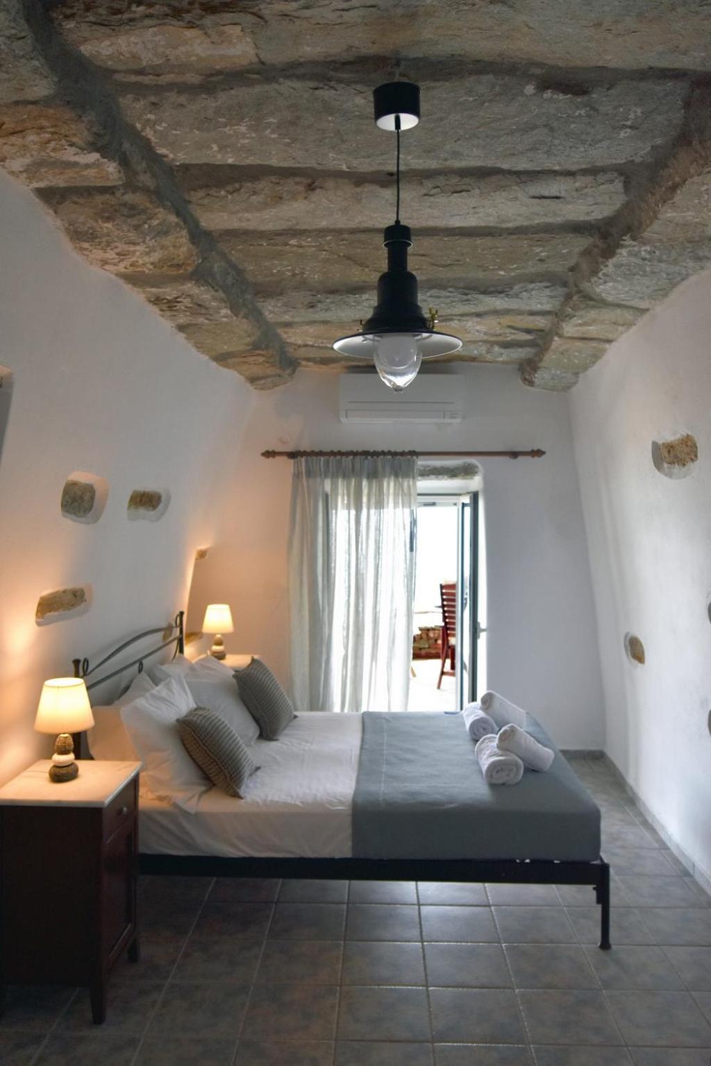 The Stone Beach House in the area of Kampi, Koundouros