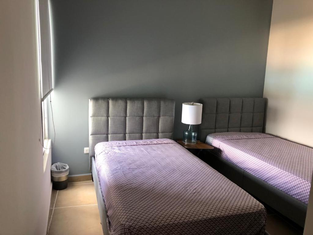 departamento en Cancún con 7 albercas tipo playa y laguna