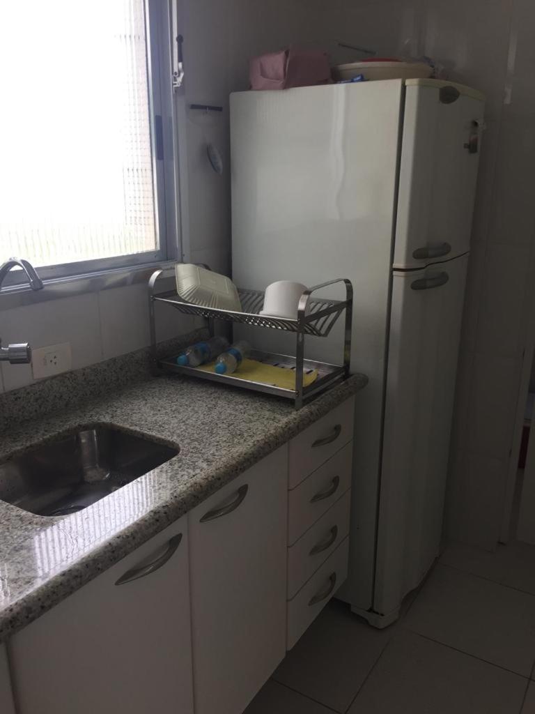 Apto frente praia Asturia Guaruja