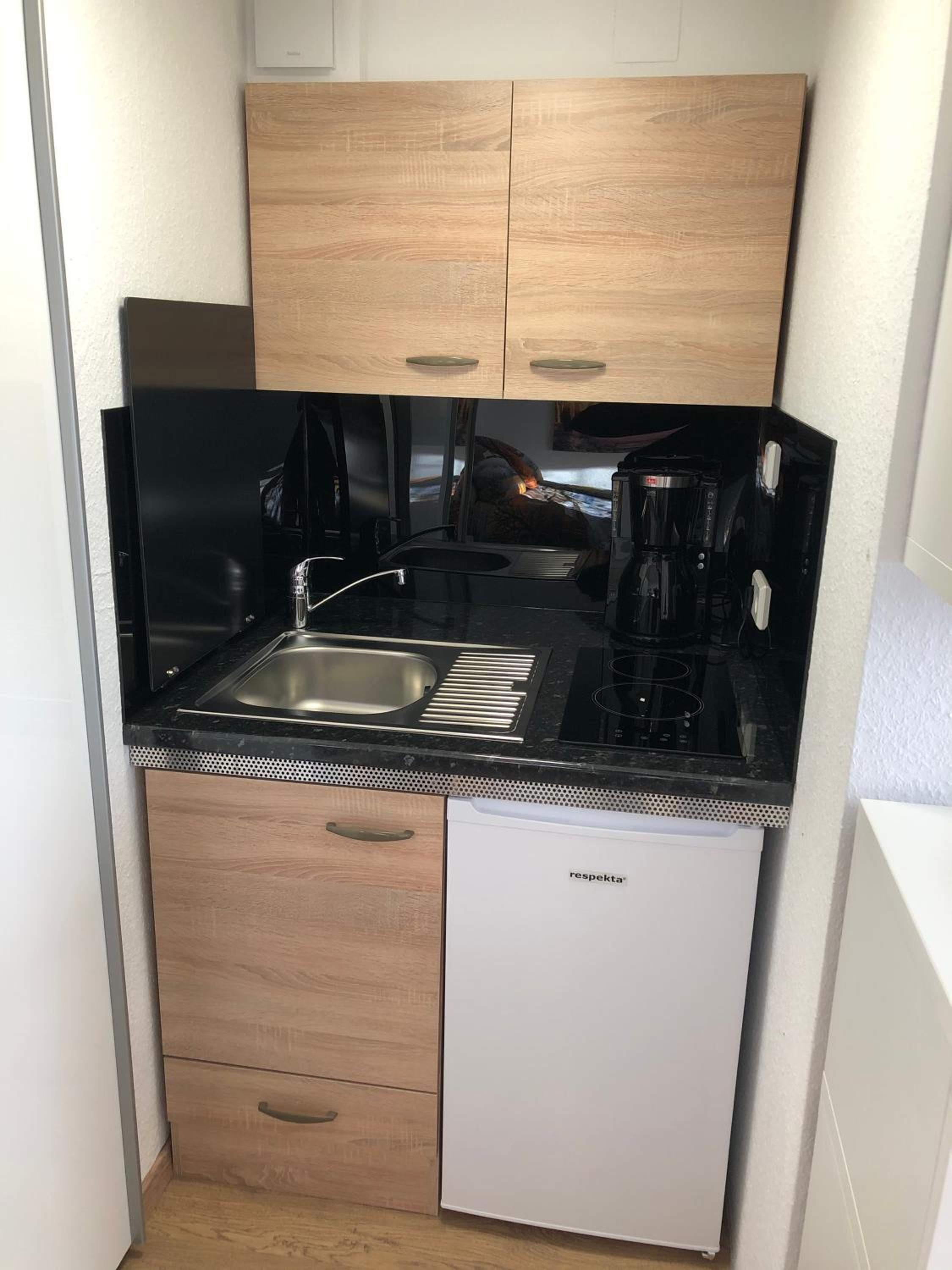 Ferienwohnung Apartment Dettum mit eigenem Bad, Kochnische und Wintergarten