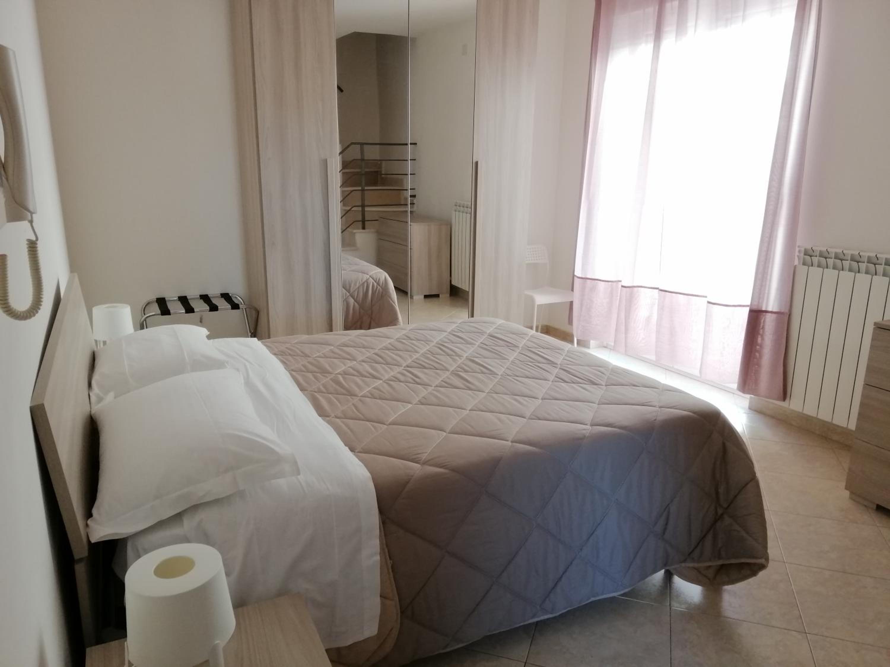 City Break en San Severo — hotel room