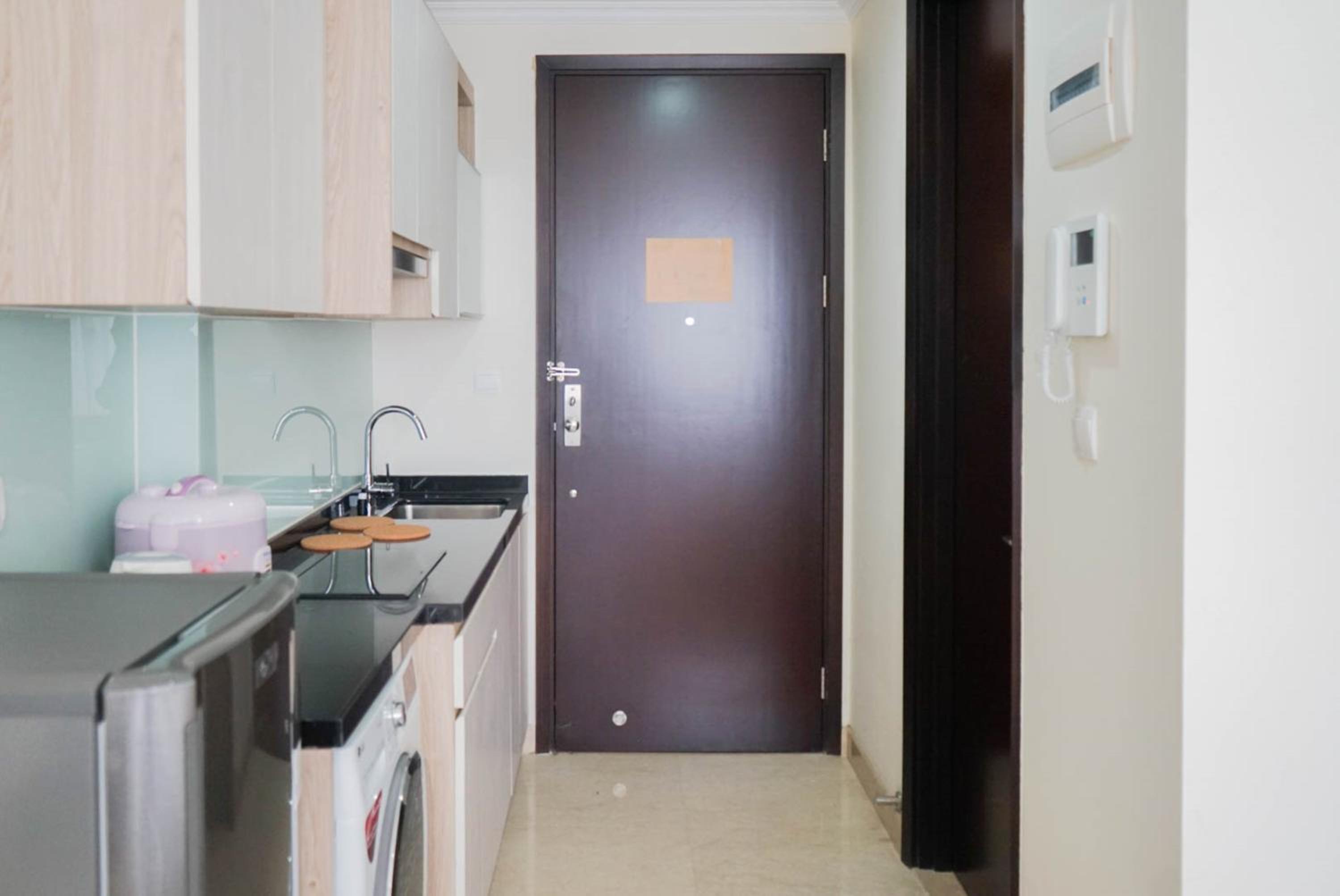 Minimalist and Homey Studio Menteng Park Apartment By Travelio view 5