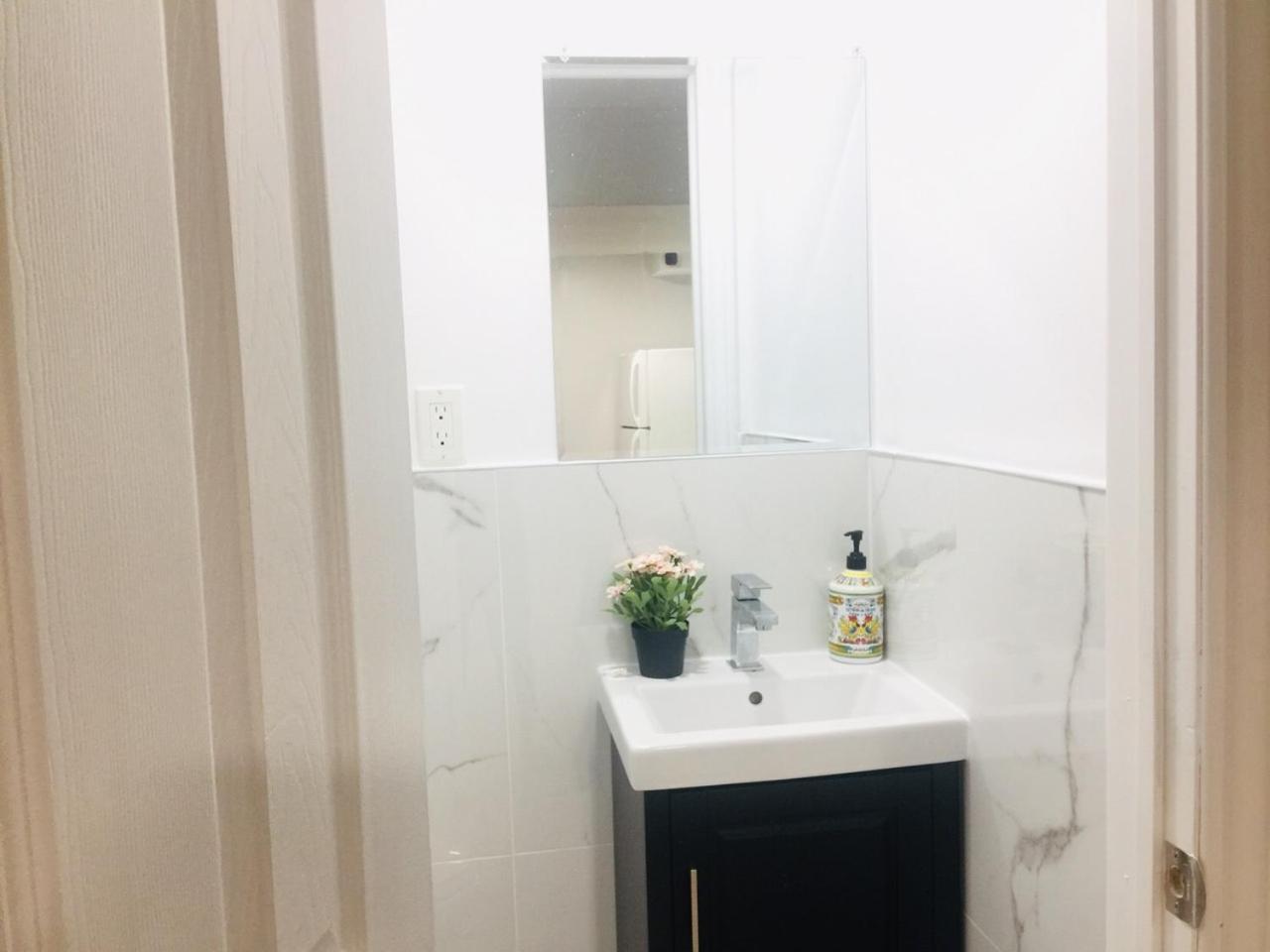 Cozy basement room-Private Bath - Near Subway line 1 - Toronto
