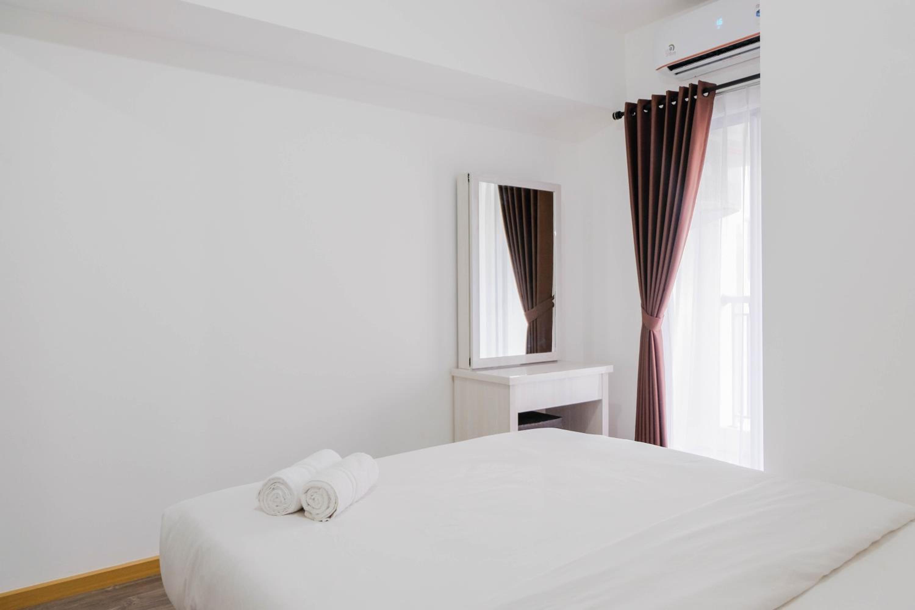 Elegant and Convenient 2BR M-Town Residence Apartment By Travelio