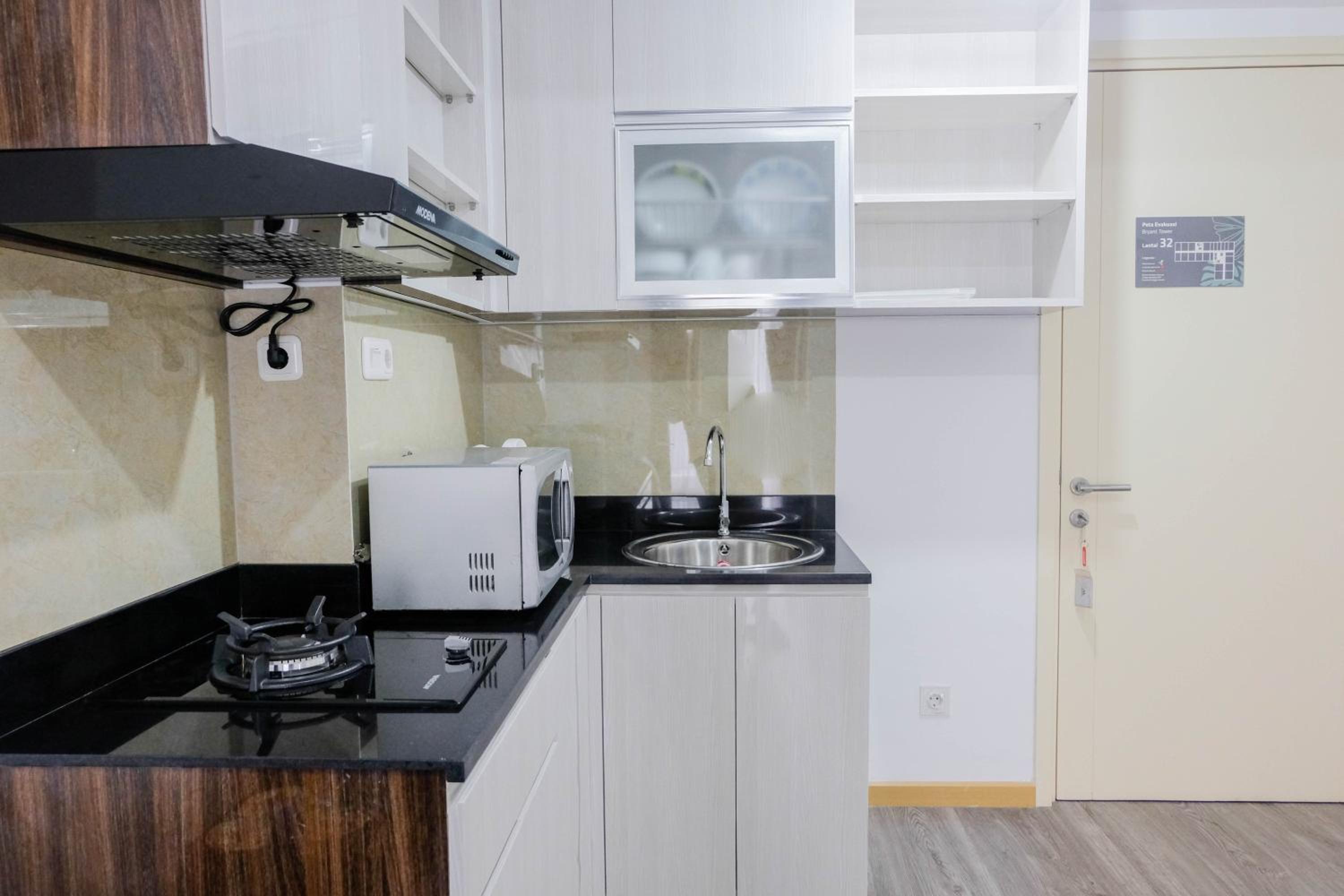 Elegant and Convenient 2BR M-Town Residence Apartment By Travelio