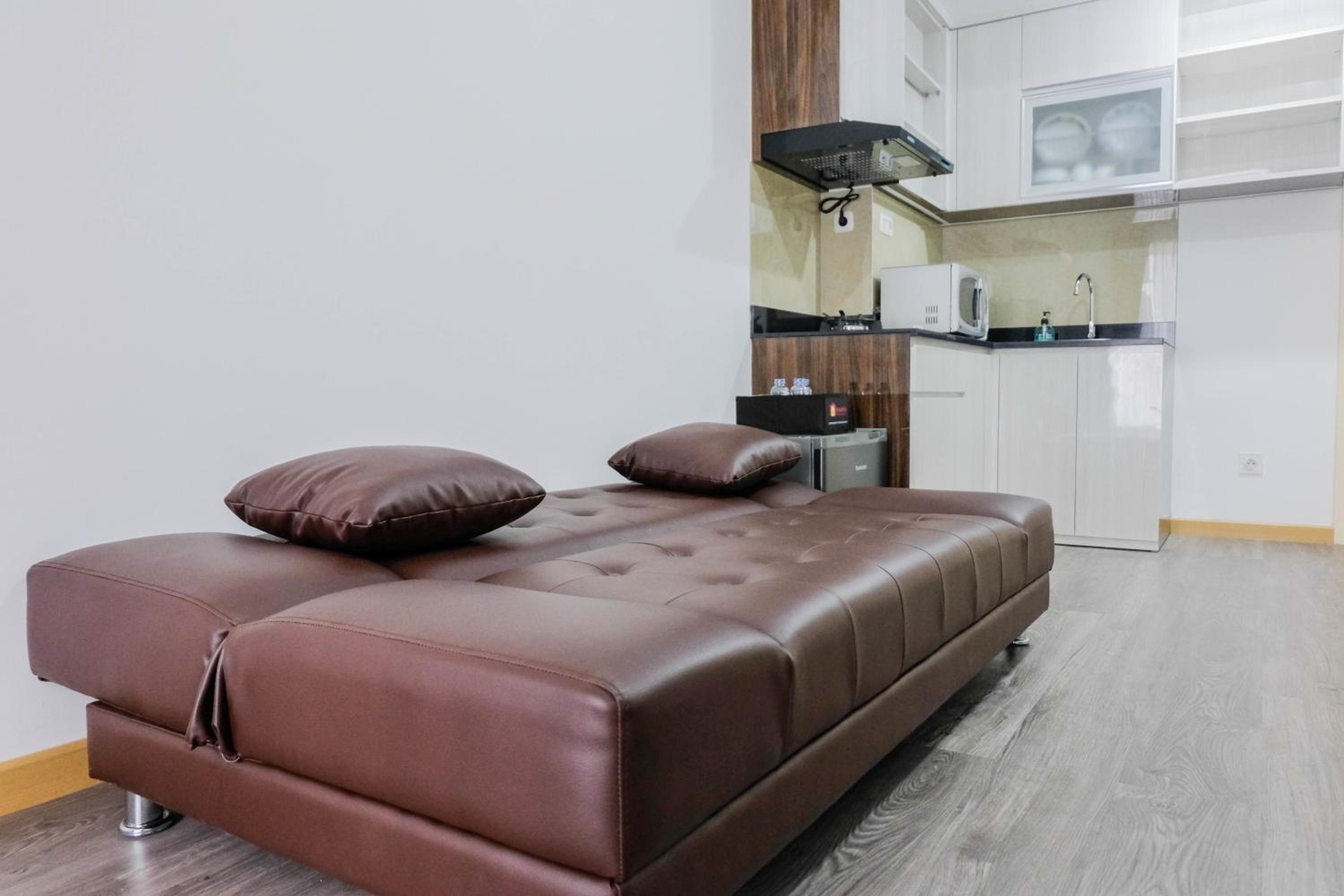 Elegant and Convenient 2BR M-Town Residence Apartment By Travelio