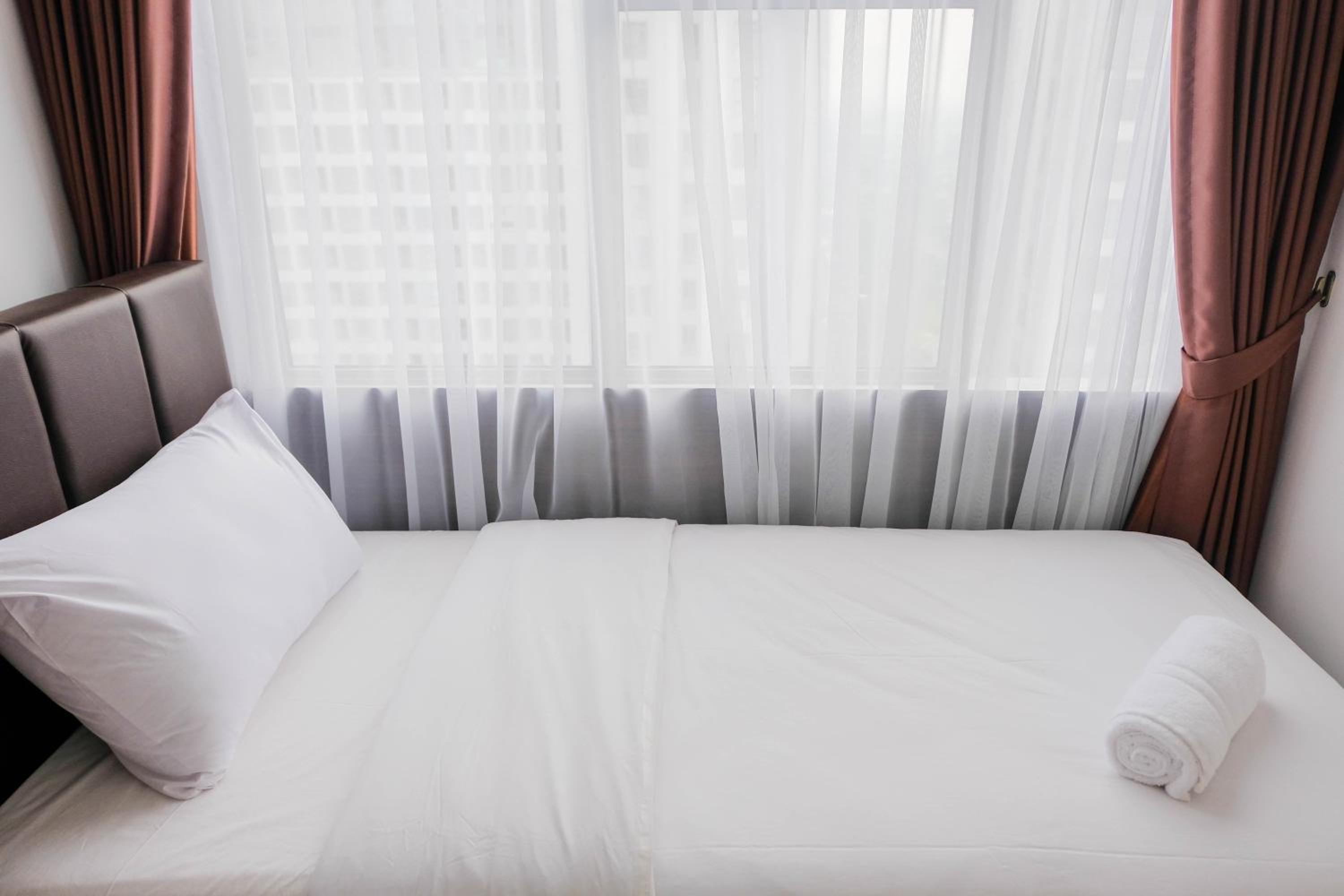 Elegant and Convenient 2BR M-Town Residence Apartment By Travelio