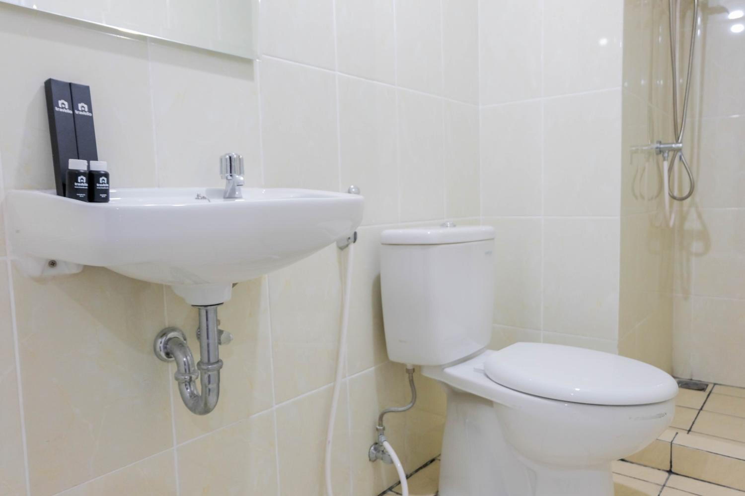 Elegant and Convenient 2BR M-Town Residence Apartment By Travelio