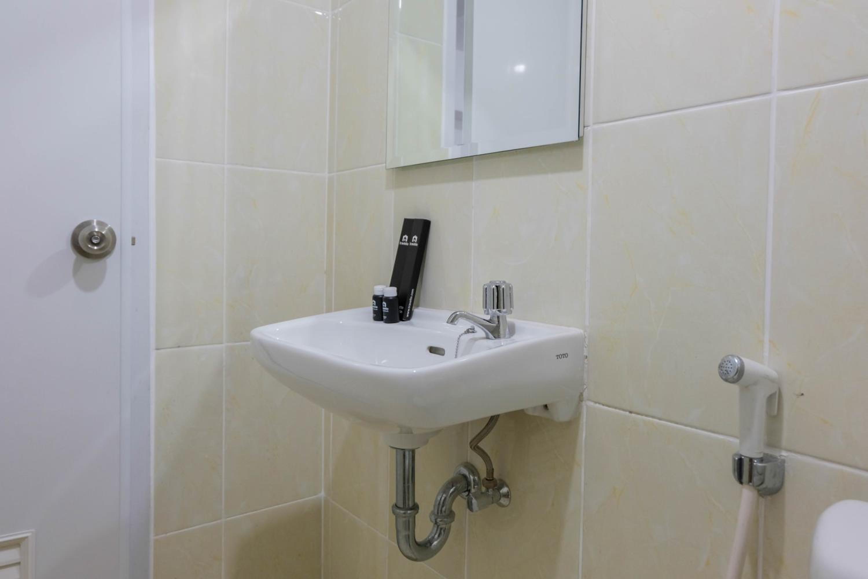 Elegant and Convenient 2BR M-Town Residence Apartment By Travelio