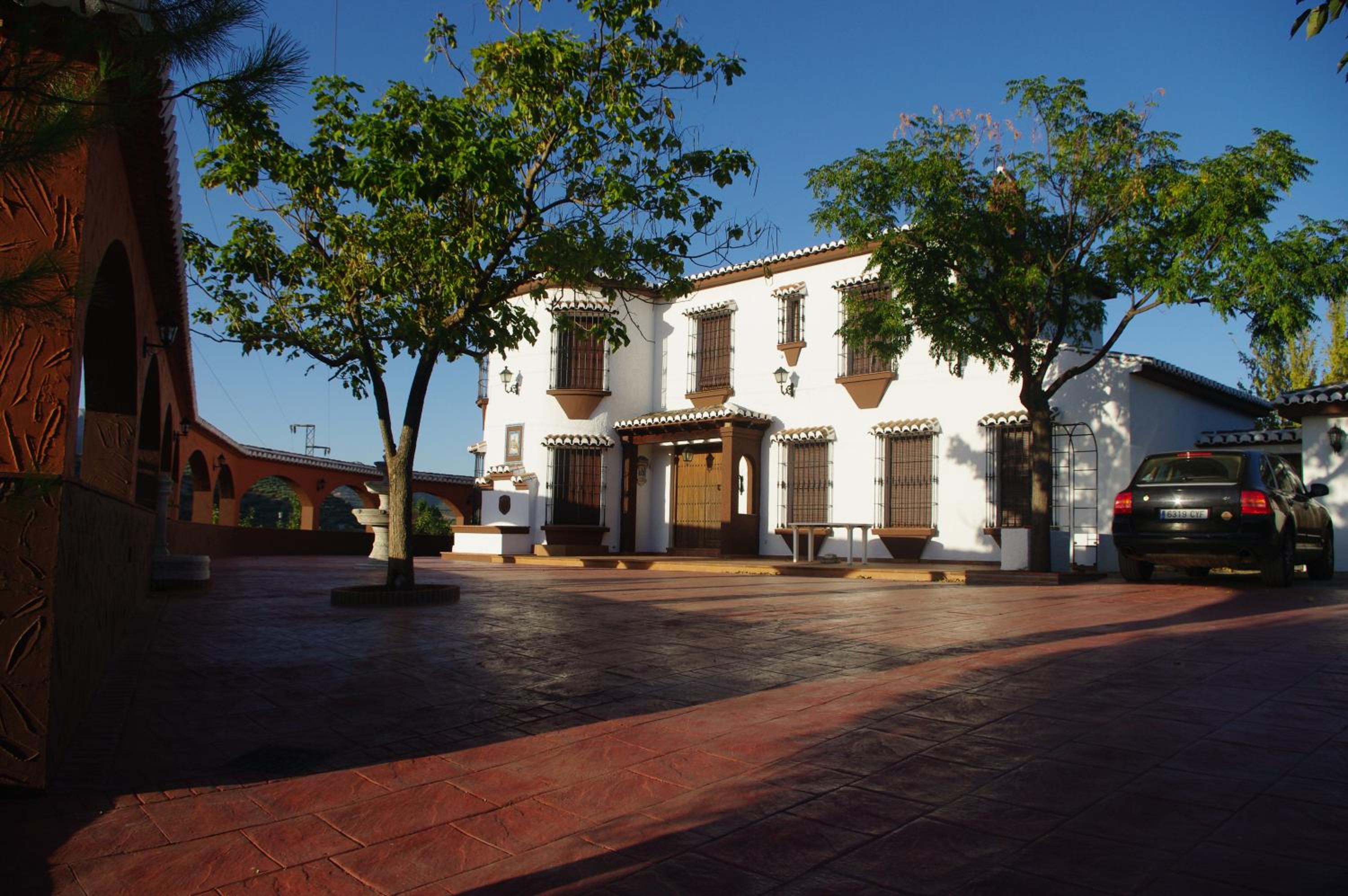 Cortijo Los Arcos - Lujo rural con piscina y vistas espectaculares en Málaga