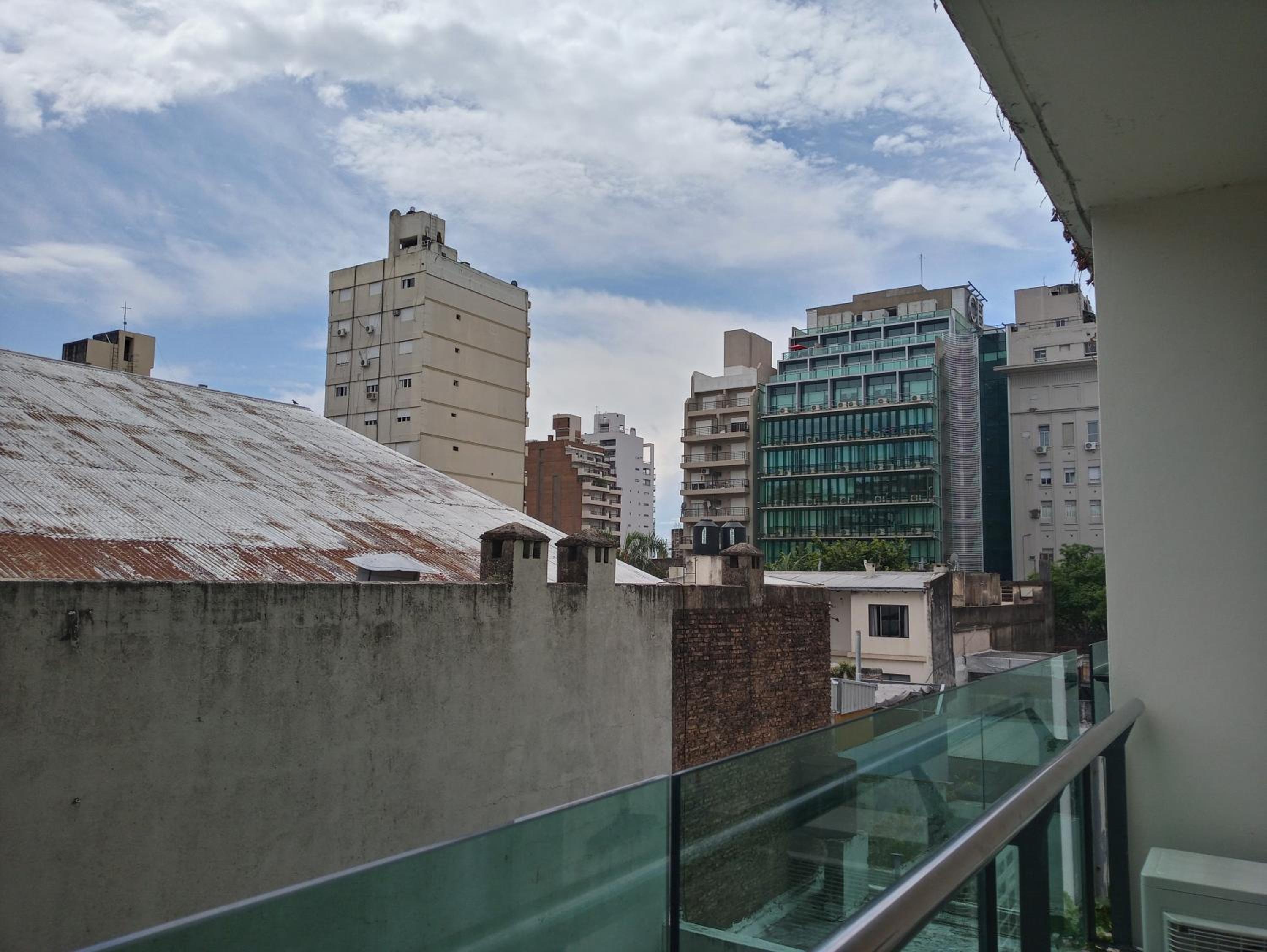 Madera Suite · Rosario centro y costanera