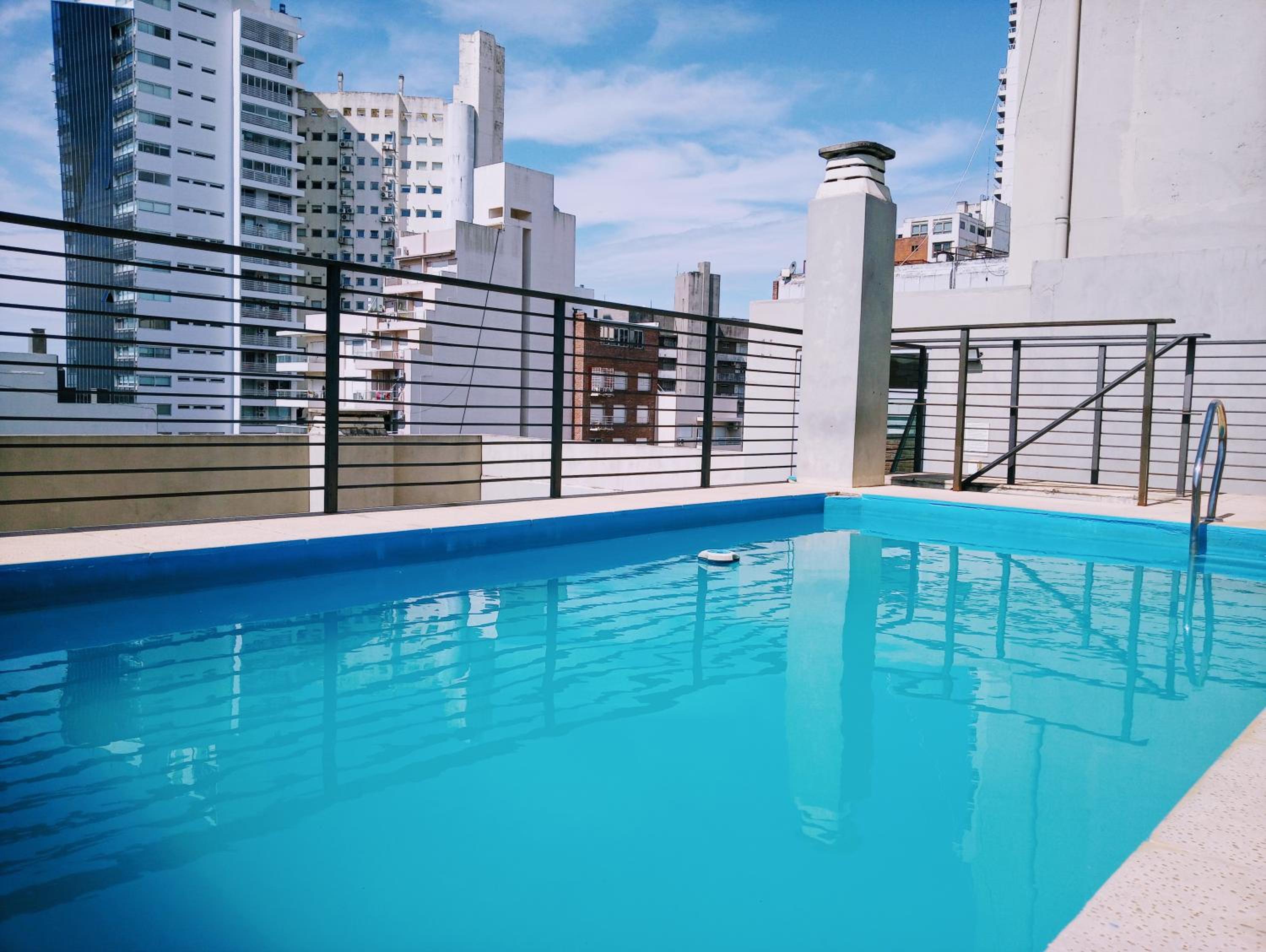 Madera Suite · Rosario centro y costanera