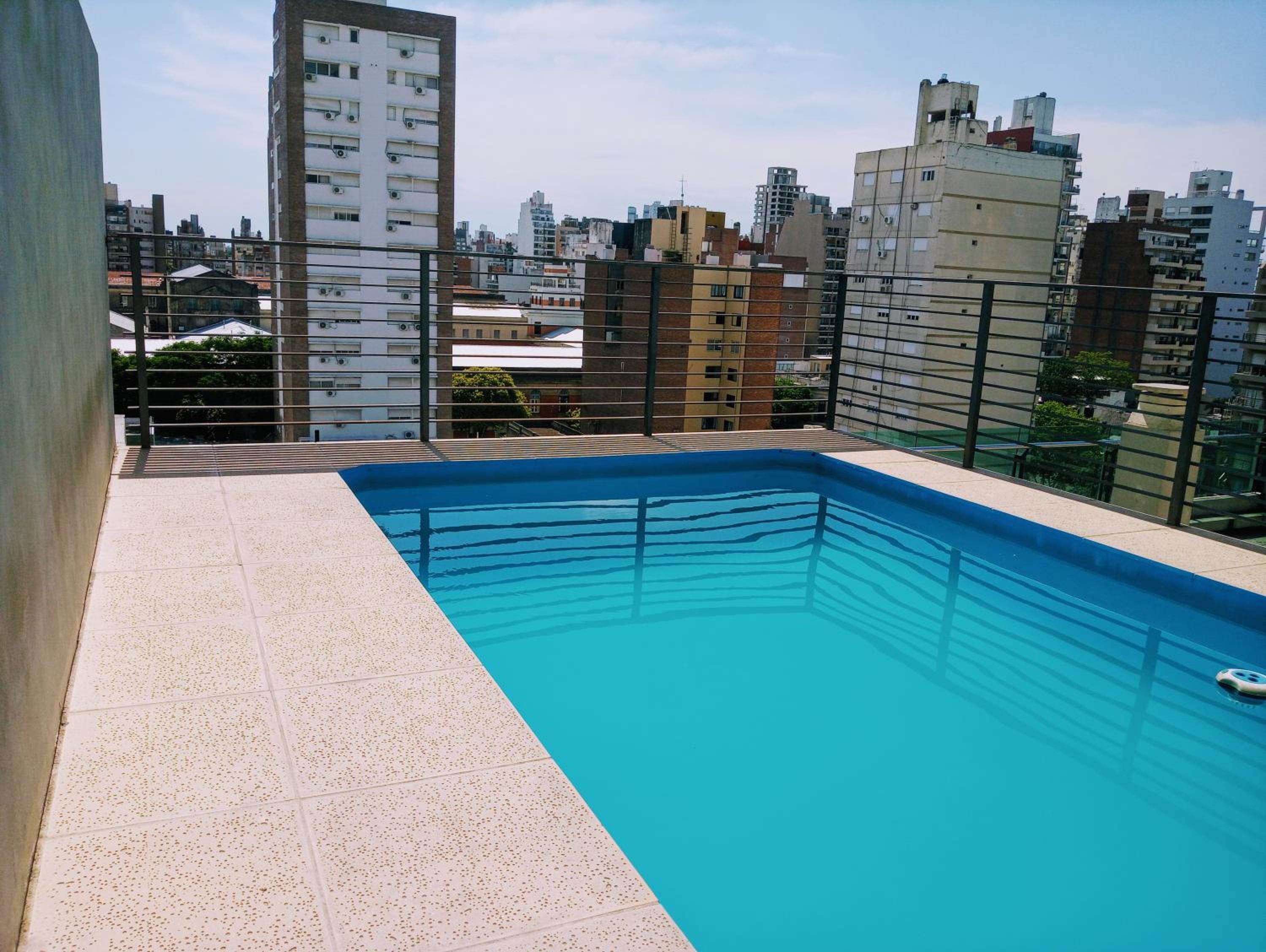 Madera Suite · Rosario centro y costanera