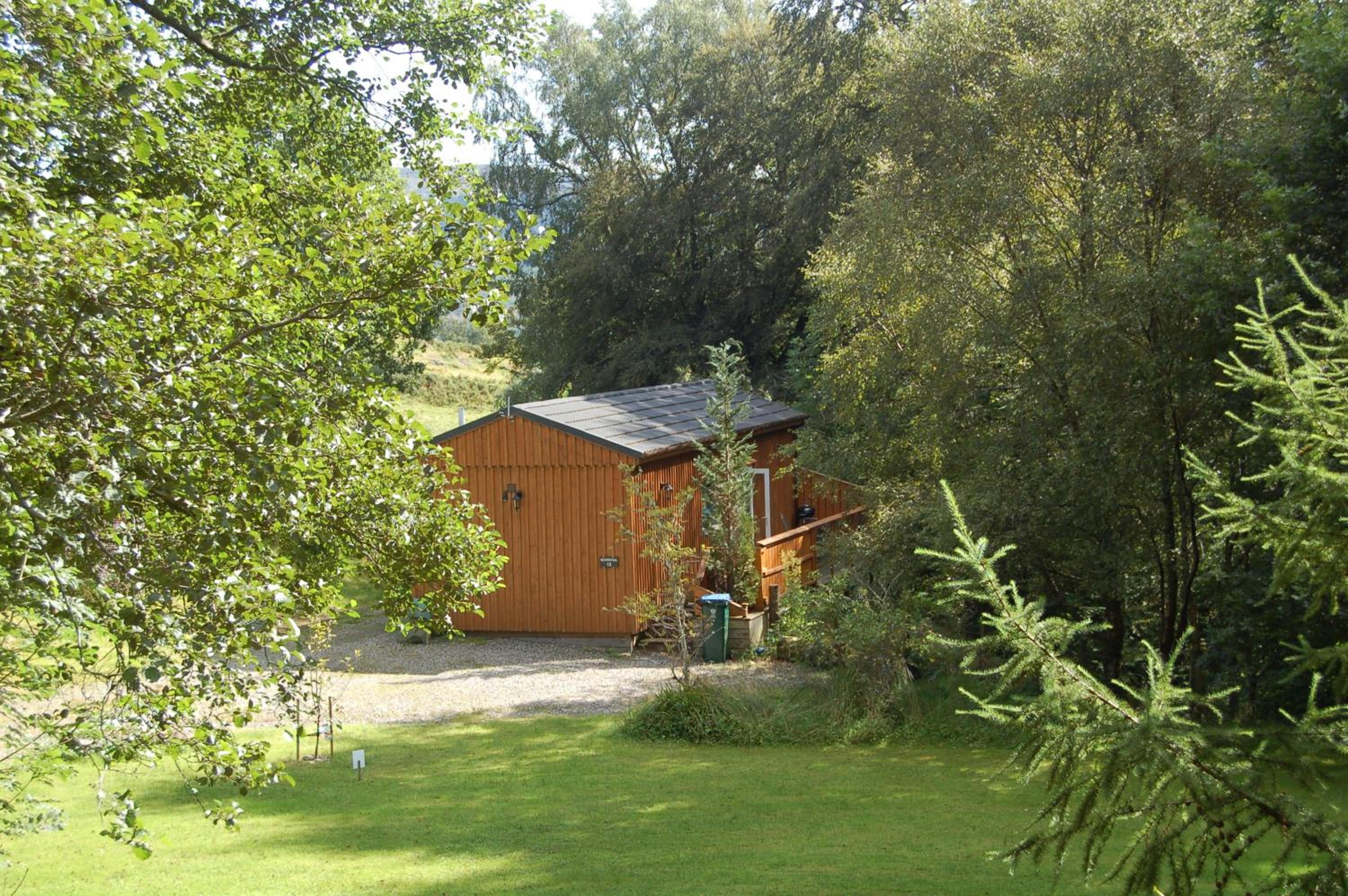 Waterfall Lodge - private waterfall and sauna view 5