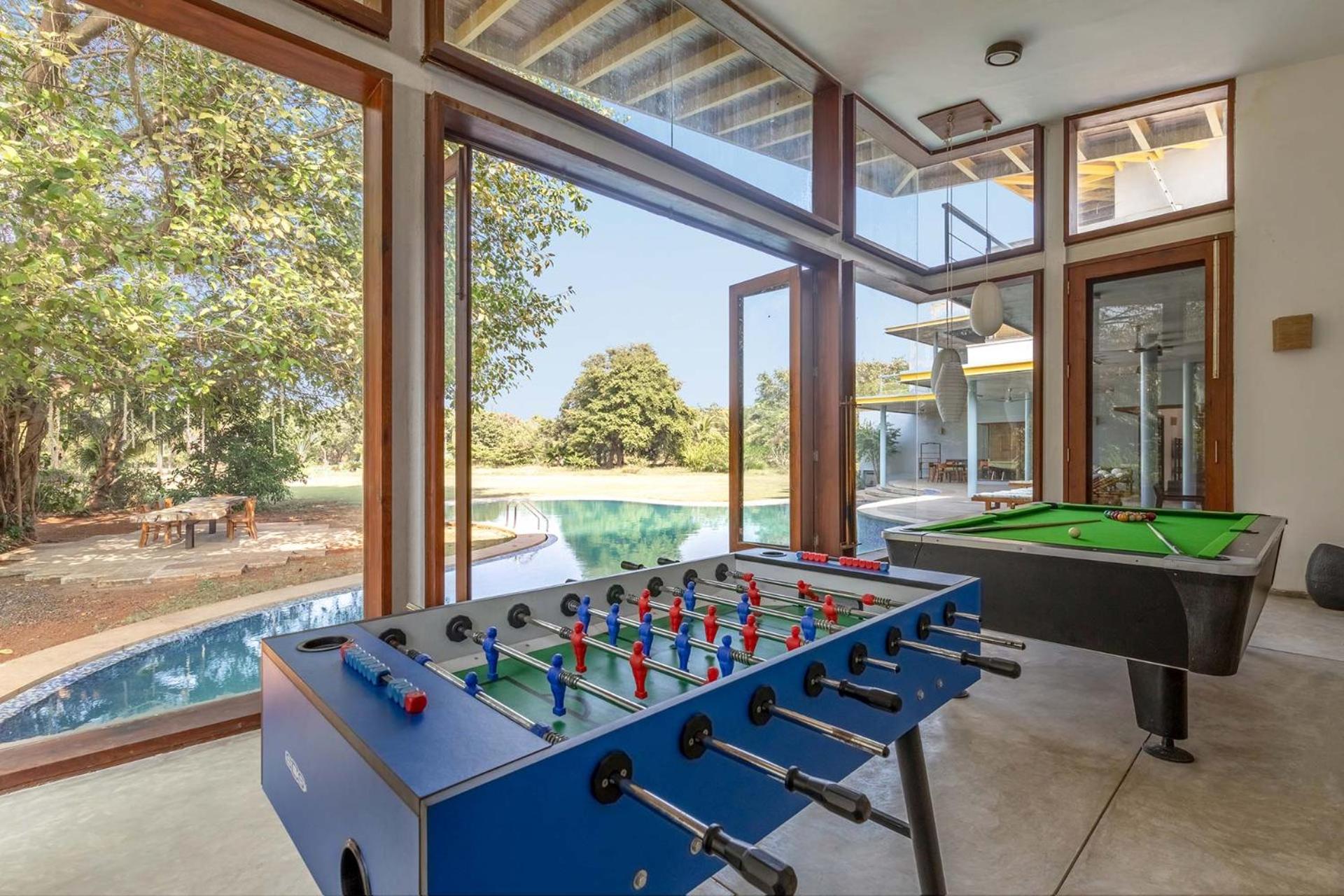 Jay House by StayVista - Leisure oasis with pool, snooker, table tennis & foosball fun view 5