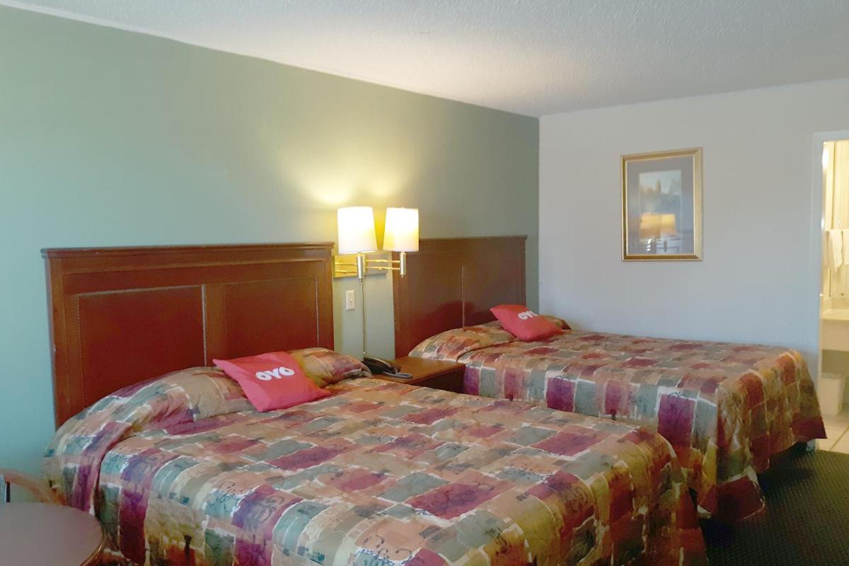 Hotel Rest Inn - Extended Stay, I-40 Airport, Wedding & Event Center - Image 1