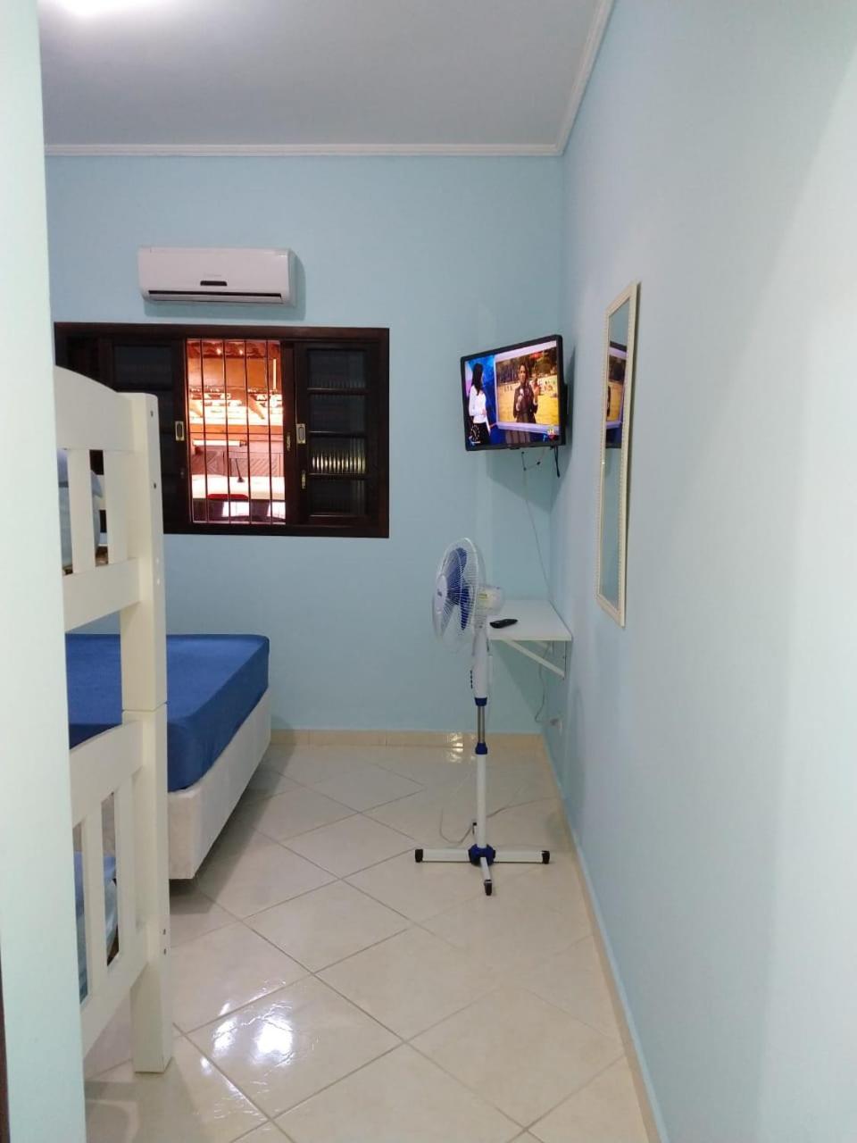 Casa Gomes com 3 suítes e ar-condicionado até 12 pessoas em Ubatuba Itaguá